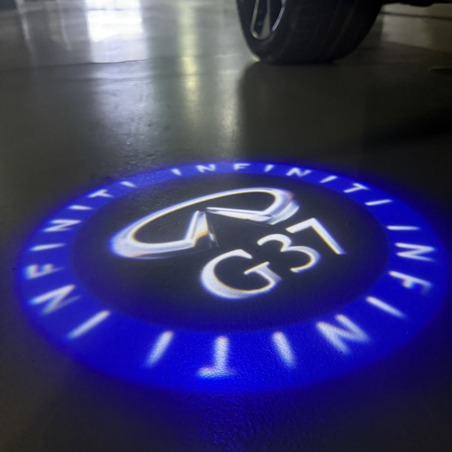INFINITI G37 LOGO PROJECROTR LIGHTS (quantity 1 = 1 sets/2 door lights)Nr.74A65