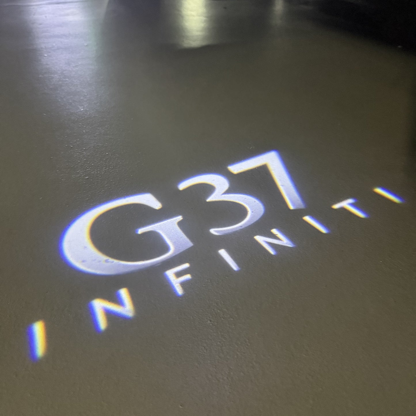 INFINITI G37 LOGO PROJECROTR LIGHTS (quantity 1 = 1 sets/2 door lights)Nr.74A62
