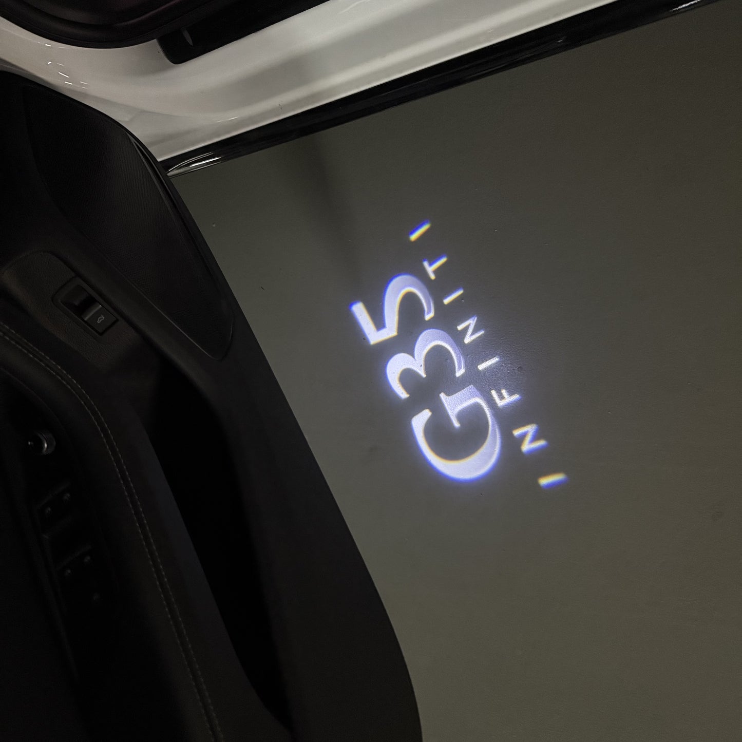 INFINITI G35 LOGO PROJECROTR LIGHTS (quantity 1 = 1 sets/2 door lights)Nr.74A56