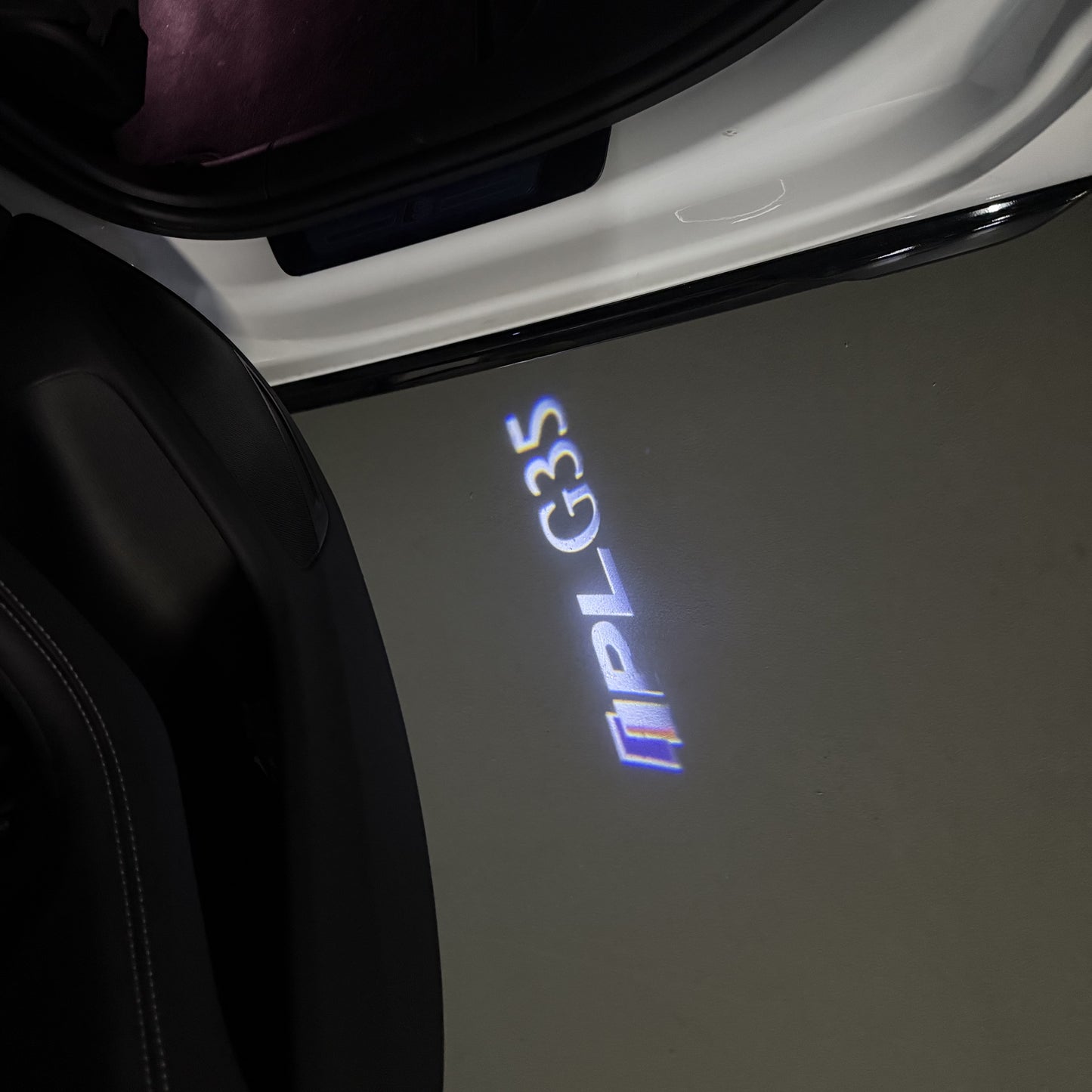 INFINITI G35 LOGO PROJECROTR LIGHTS (quantity 1 = 1 sets/2 door lights)Nr.74A57