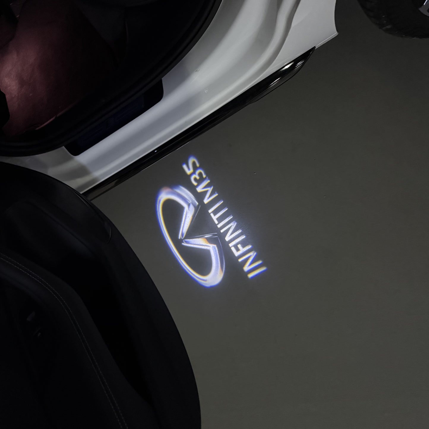 INFINITI M35 LOGO PROJECROTR LIGHTS (quantity 1 = 1 sets/2 door lights)Nr.74A91