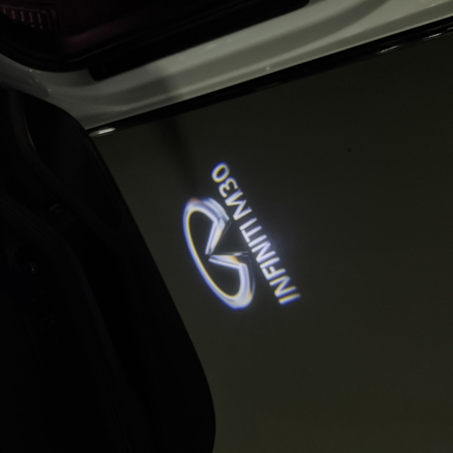 INFINITI M30 LOGO PROJECROTR LIGHTS (quantity 1 = 1 sets/2 door lights)Nr.74A98