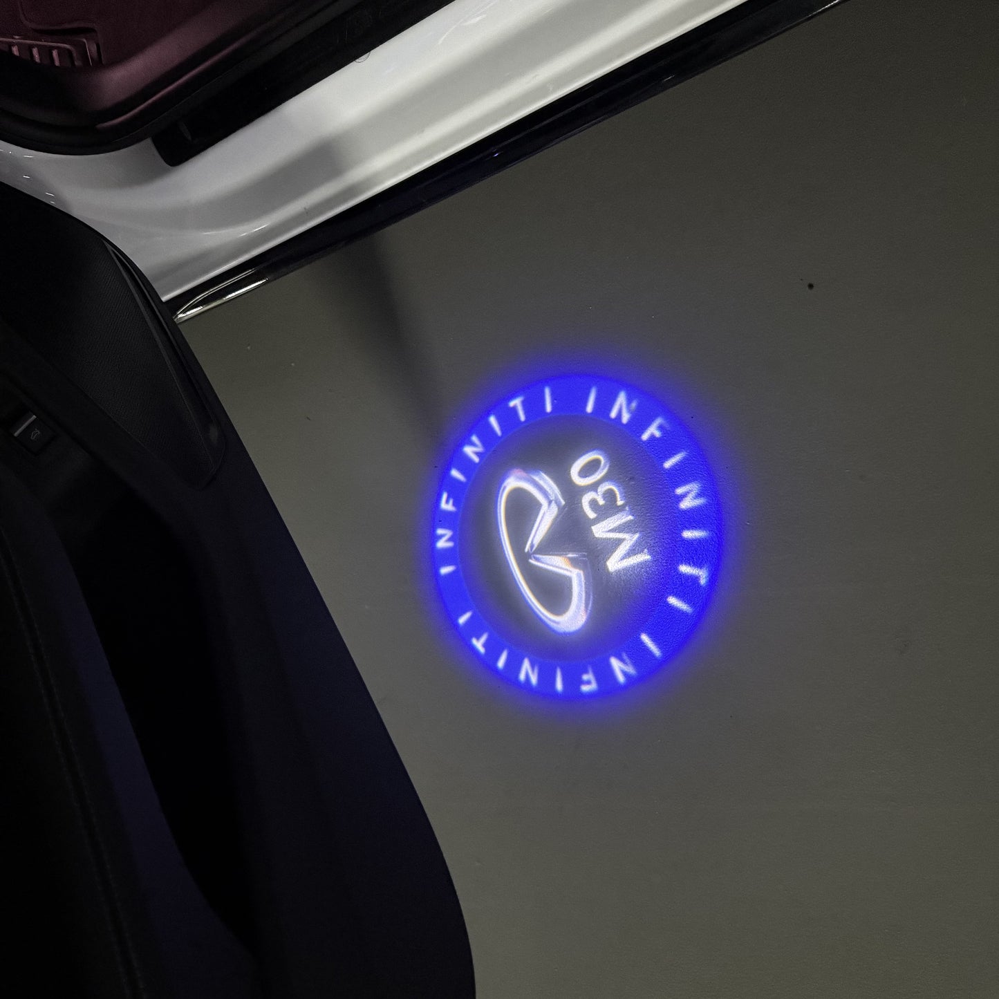 INFINITI M30 LOGO PROJECROTR LIGHTS (quantity 1 = 1 sets/2 door lights)Nr.74A96