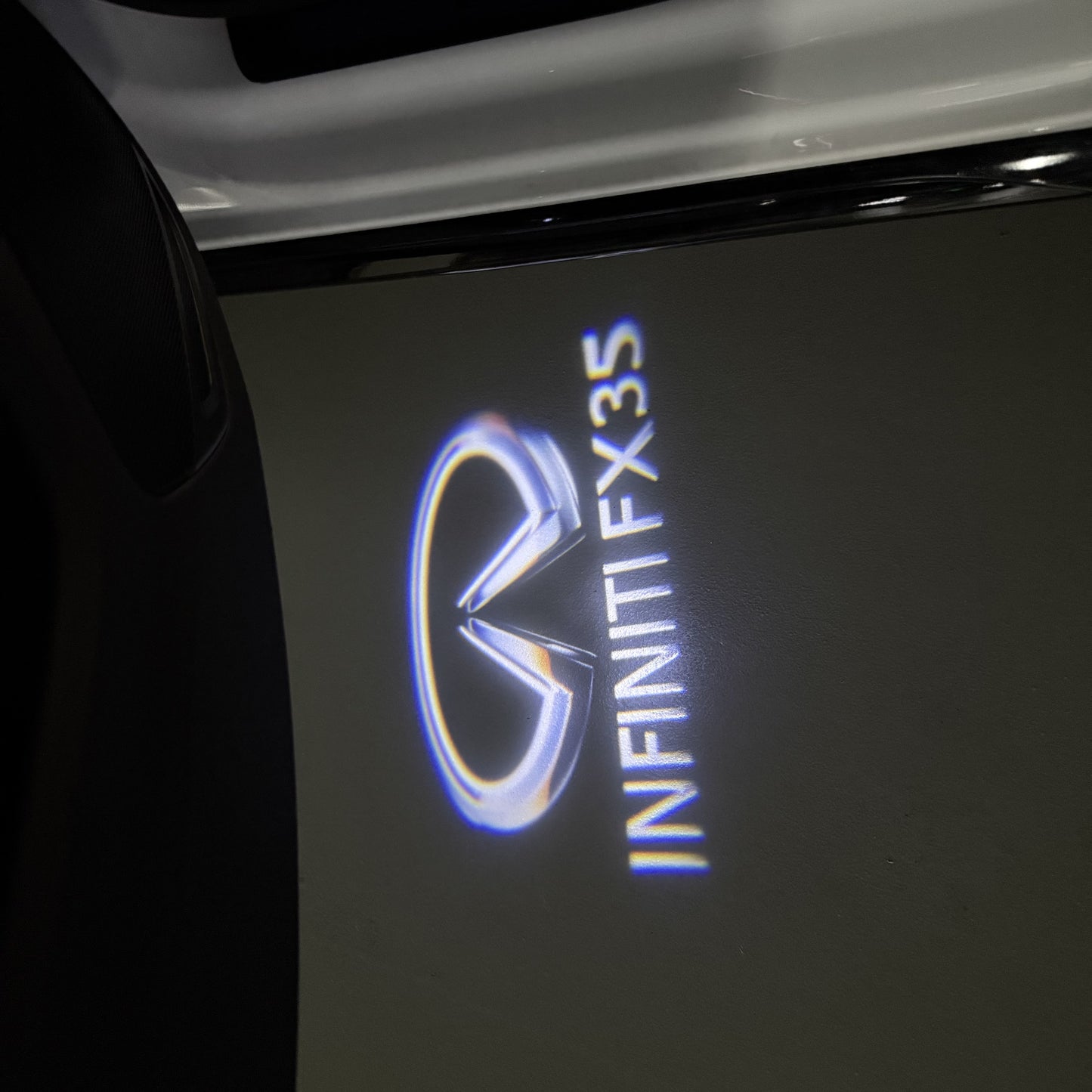 INFINITI FX35 LOGO PROJECROTR LIGHTS (quantity 1 = 1 sets/2 door lights)Nr.74A70