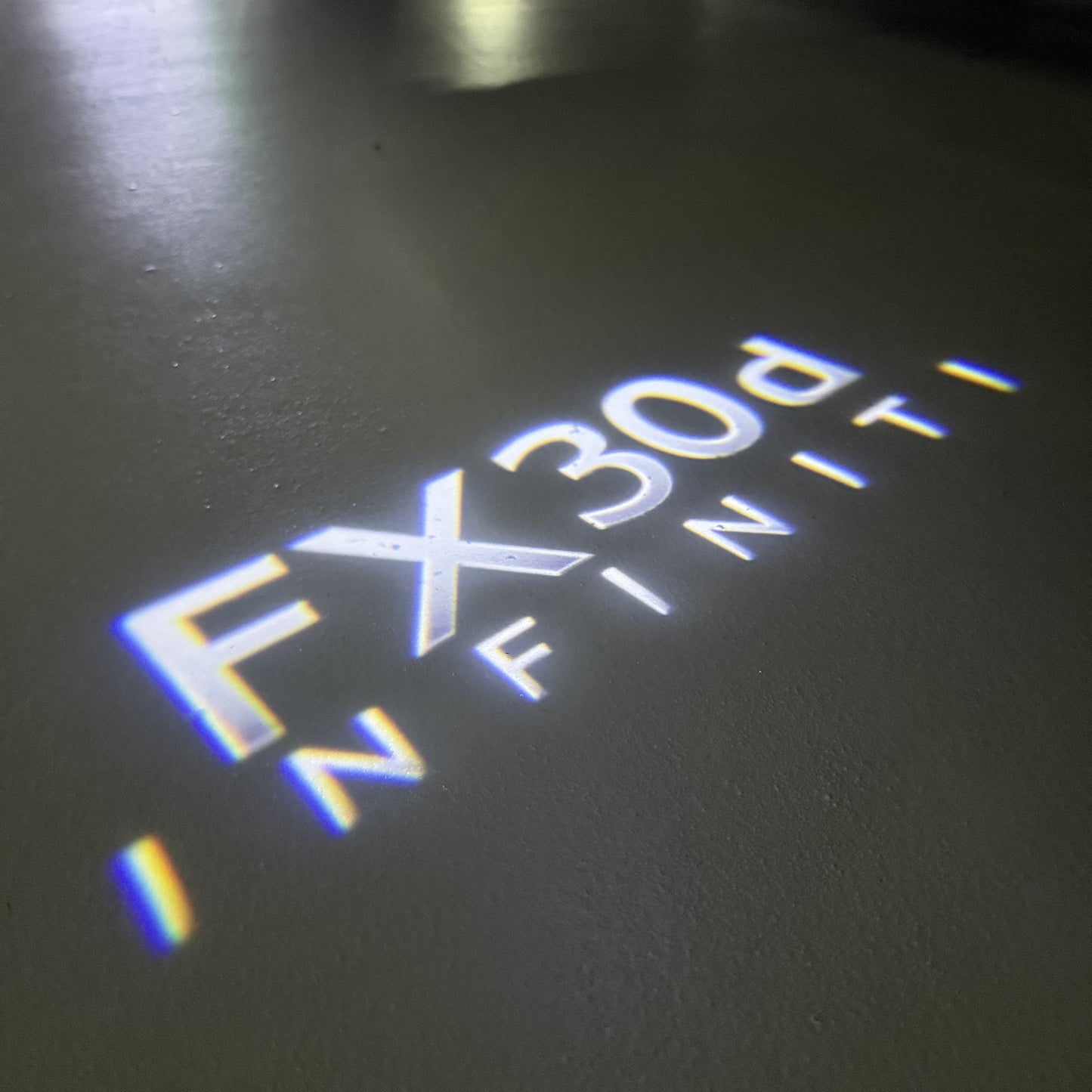 INFINITI FX30d LOGO PROJECROTR LIGHTS (quantity 1 = 1 sets/2 door lights)Nr.74A77