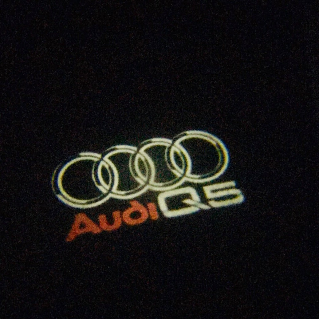 AUDI Q5 LOGO PROJECTOT LIGHTS Nr.48 (quantity 1 = 2 Logo Films /2 door lights)