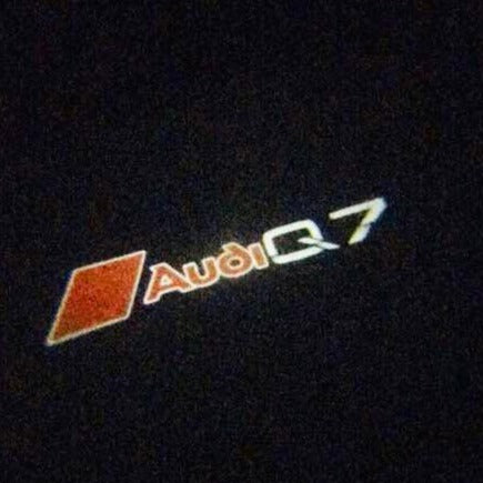 AUDI Q7 LOGO PROJECTOT LIGHTS Nr.82 (quantity 1 = 2 Logo Films /2 door lights)