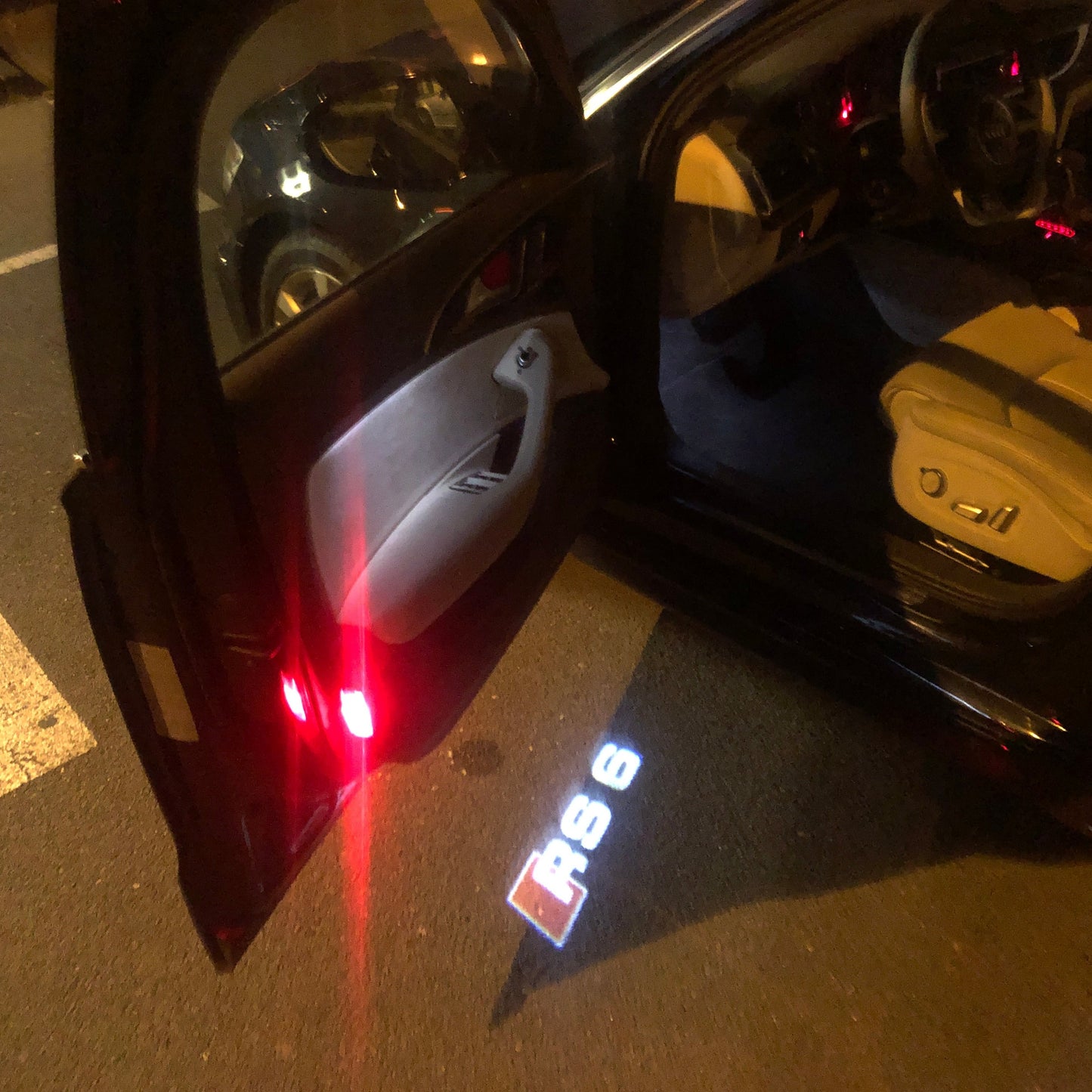 AUDI RS6 LOGO PROJECTOT LIGHTS Nr.55 (quantity 1 = 2 Logo Films /2 door lights)