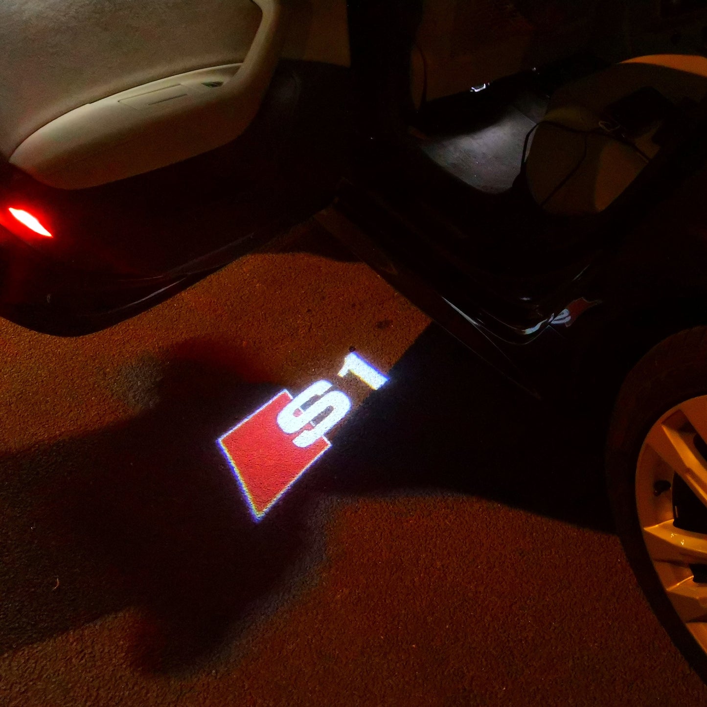 AUDI S1 LOGO PROJECTOT LIGHTS Nr.23 (quantity 1 = 2 Logo Films /2 door lights)