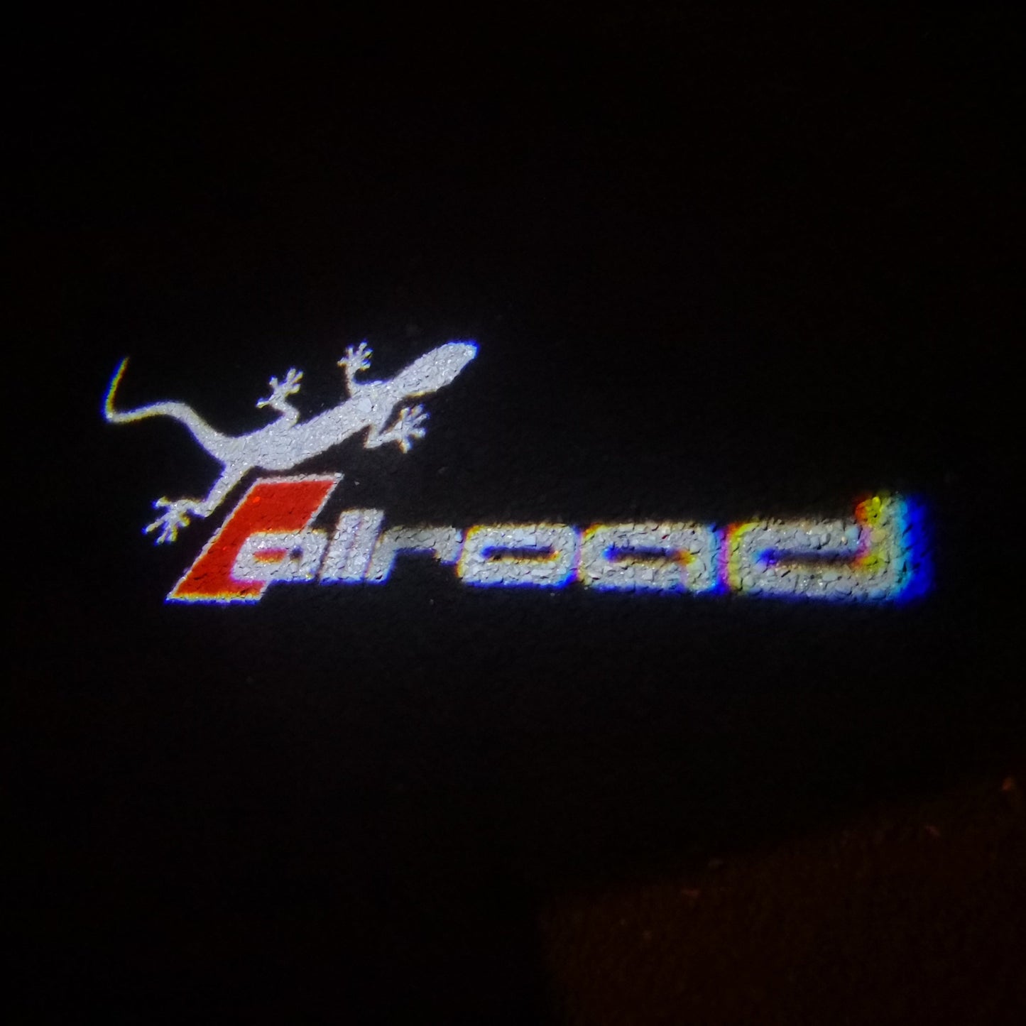 AUDI ALLROAD LOGO PROJECTOT LIGHTS Nr.147 (quantity 1 = 2 Logo Films & 2 door lights)