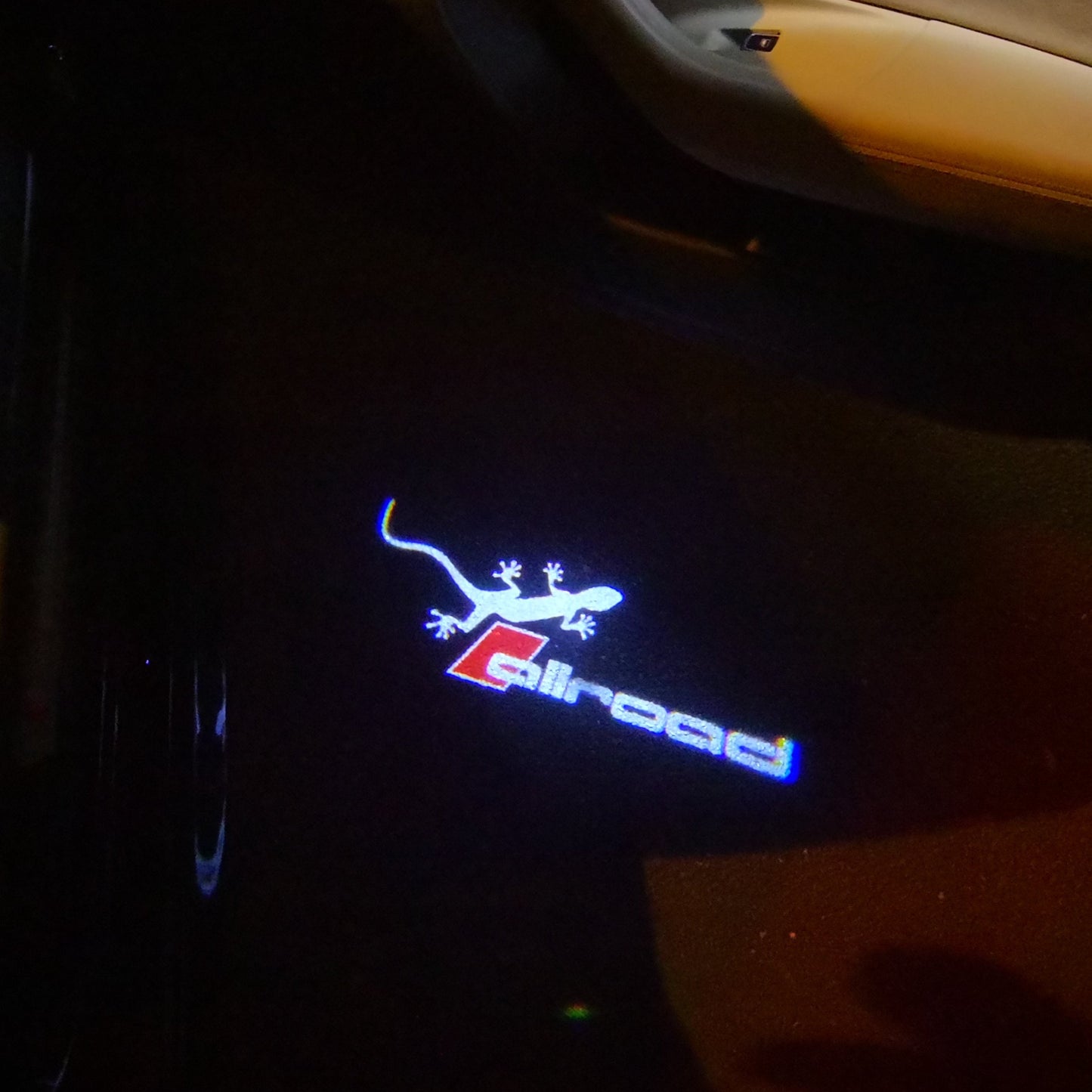 AUDI ALLROAD LOGO PROJECTOT LIGHTS Nr.147 (quantity 1 = 2 Logo Films & 2 door lights)