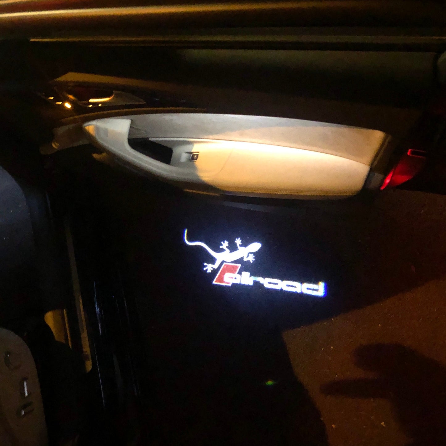 AUDI ALLROAD LOGO PROJECTOT LIGHTS Nr.147 (quantity 1 = 2 Logo Films & 2 door lights)