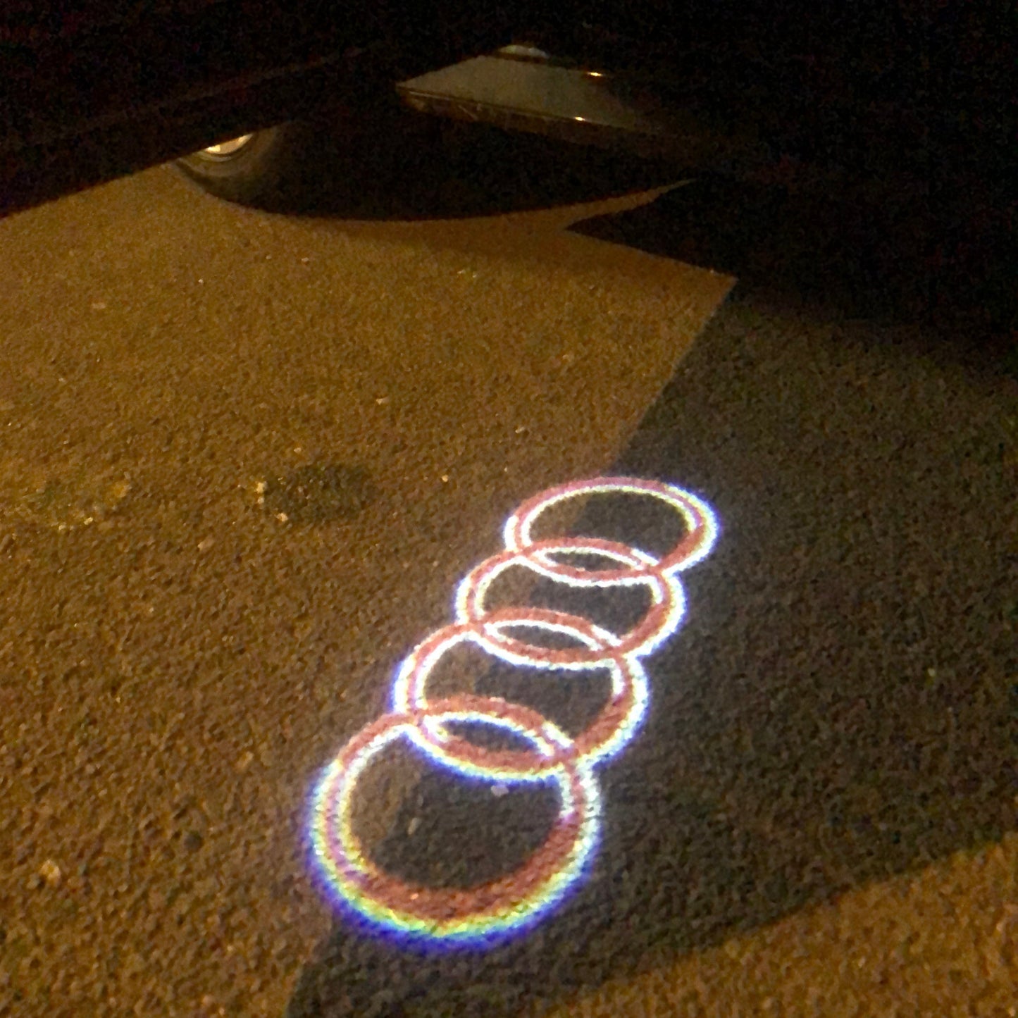 AUDI 4 RINGS LOGO PROJECTOT LIGHTS Nr.143 (quantity 1 = 2 Logo Films /2 door lights )