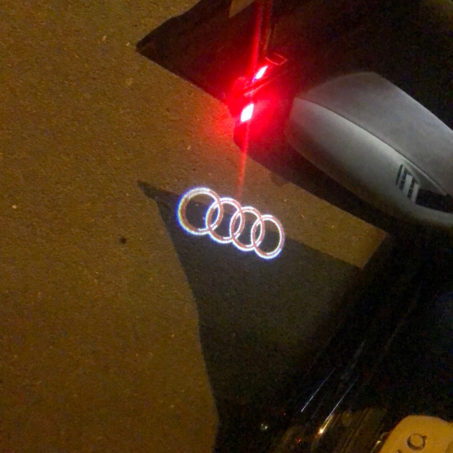 AUDI 4 RINGS LOGO PROJECTOT LIGHTS Nr.143 (quantity 1 = 2 Logo Films /2 door lights )