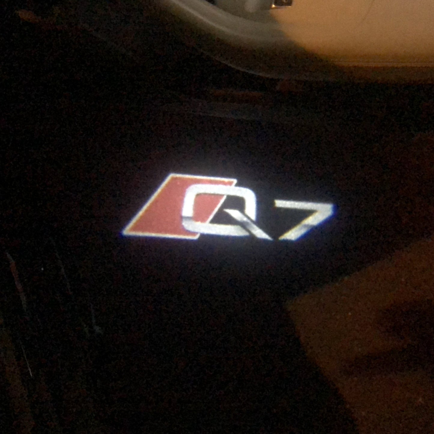 AUDI Q7 LOGO PROJECTOT LIGHTS Nr.79 (quantity 1 = 2 Logo Films /2 door lights)