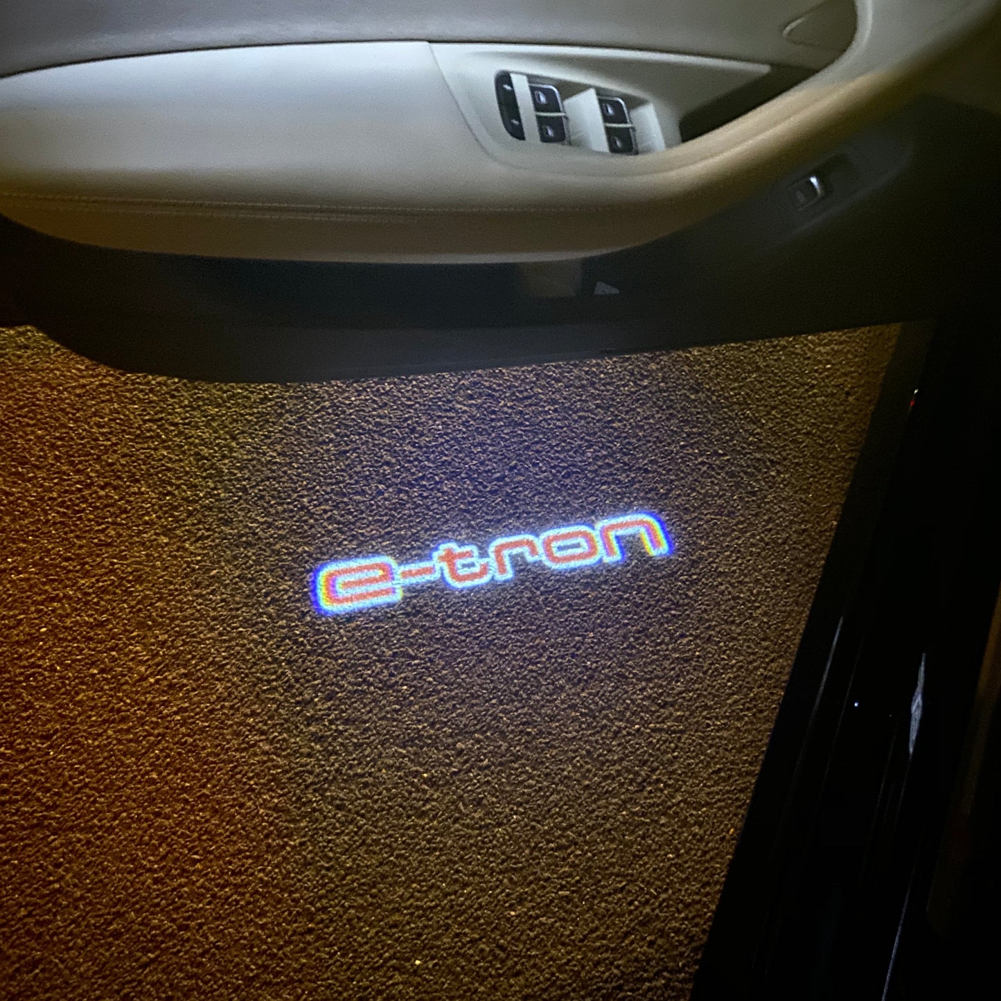 AUDI E-TRON LOGO PROJECTOT LIGHTS Nr.289 (quantity 1 = 2 Logo Films /2 door lights)