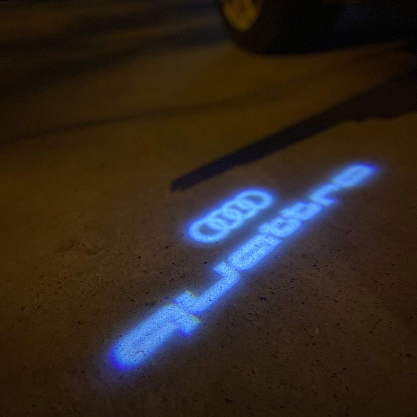 AUDI QUATTRO LOGO PROJECTOT LIGHTS Nr.955 (quantity 1 = 2 Logo Films /2 door lights)