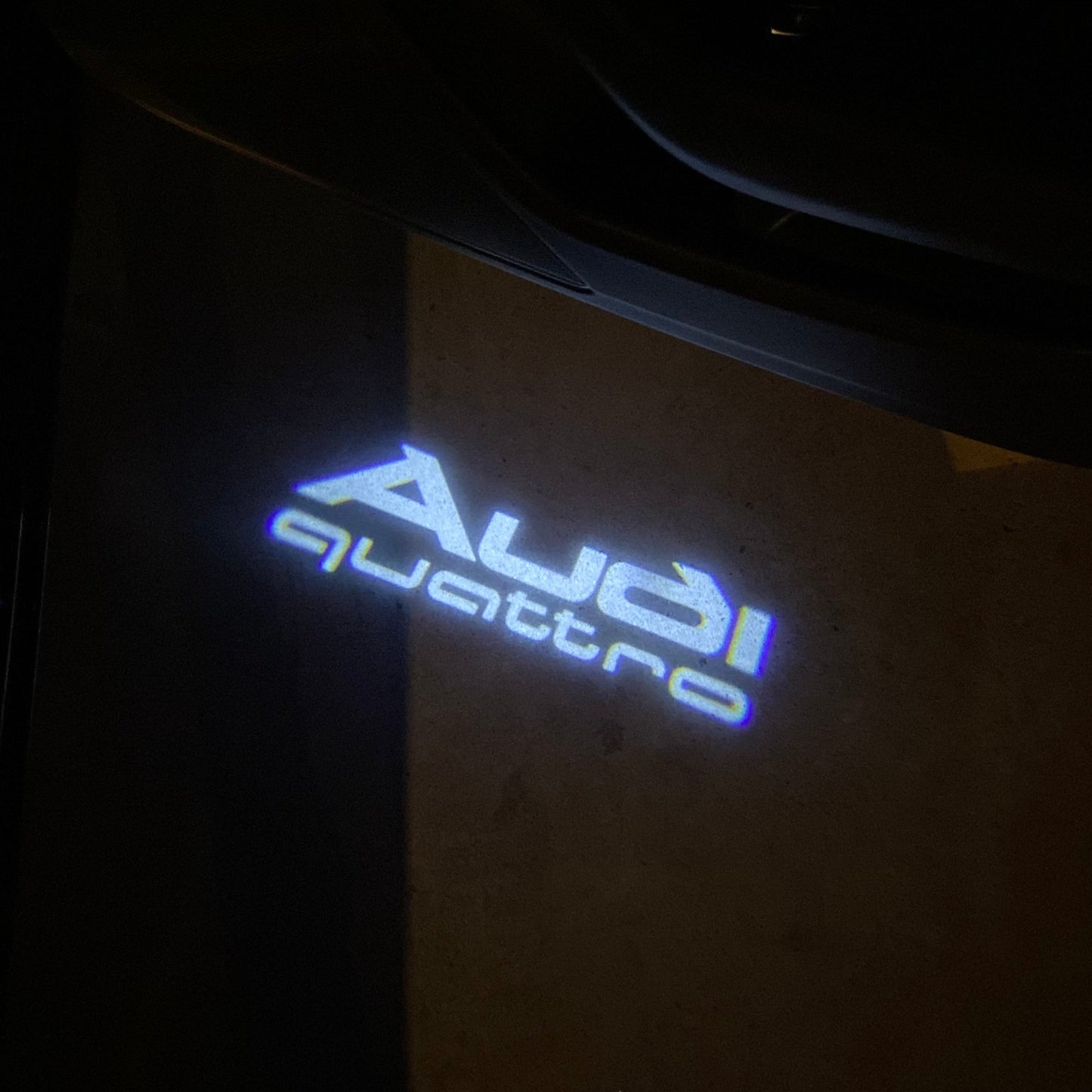 AUDI QUATTRO LOGO PROJECTOT LIGHTS Nr.958 (quantity 1 = 2 Logo Films /2 door lights)