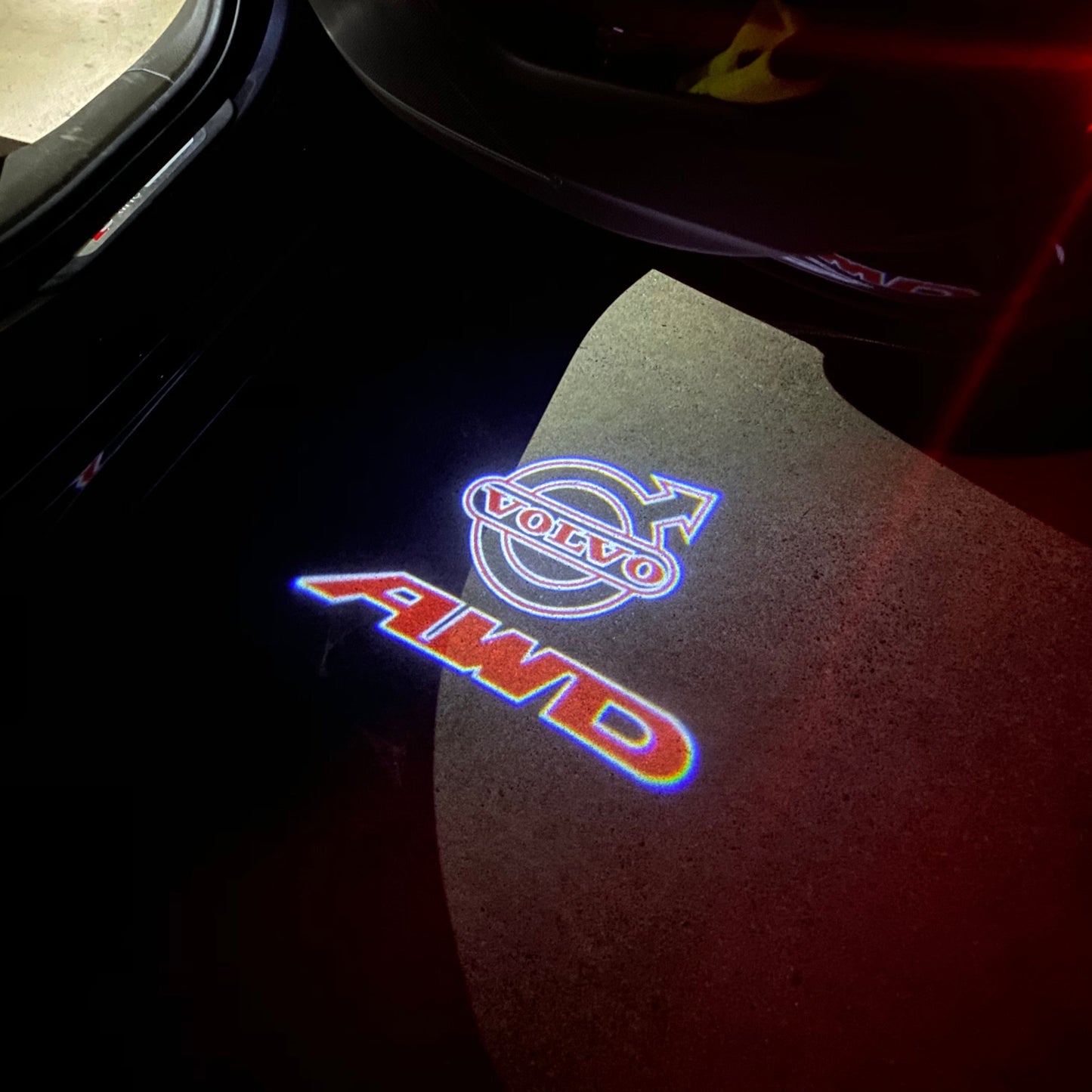 Volvo AWD LOGO PROJECROTR LIGHTS Nr.65 (quantity 1 = 2 Logo Film / 2 door lights)