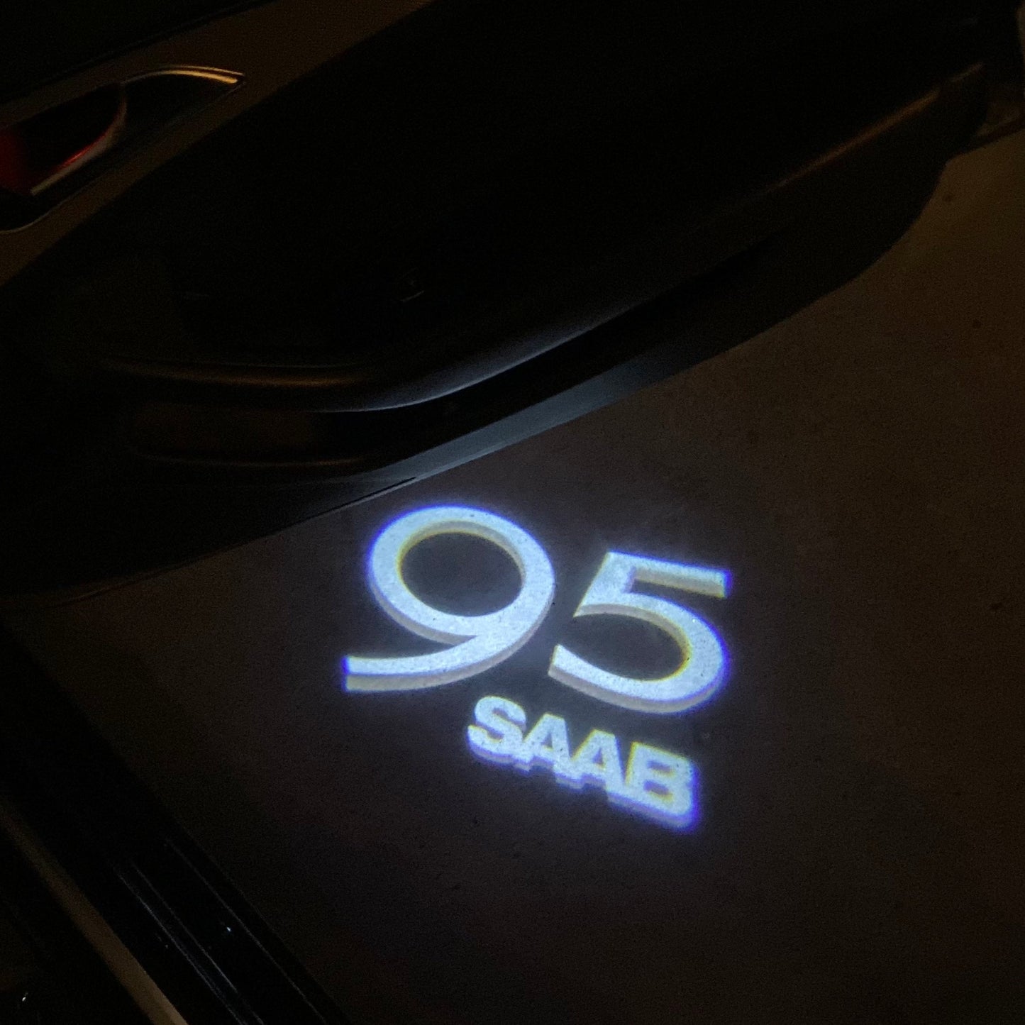 SAAB 95 LOGO PROJECROTR LIGHTS Nr.2505 (quantity 1 = 1 sets/2 door lights)