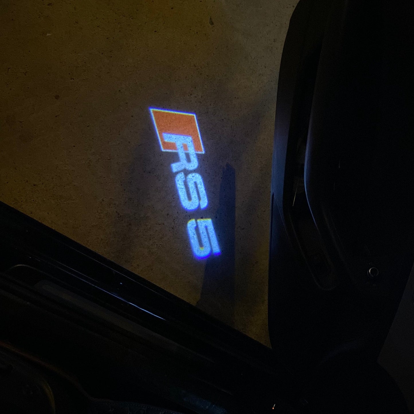 AUDI RS5 LOGO PROJECTOT LIGHTS Nr.54 (quantity 1 = 2 Logo Films /2 door lights)