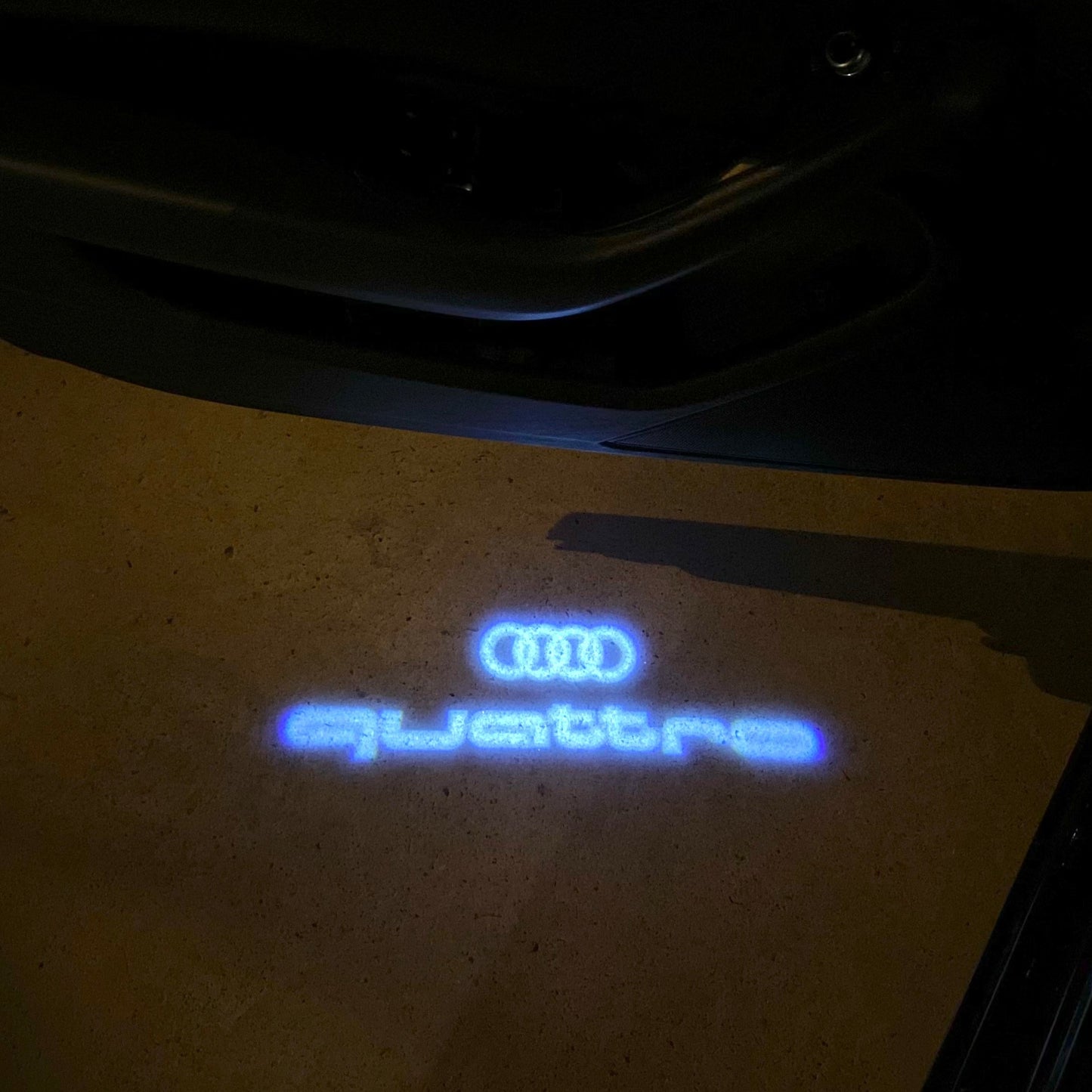 AUDI QUATTRO LOGO PROJECTOT LIGHTS Nr.955 (quantity 1 = 2 Logo Films /2 door lights)