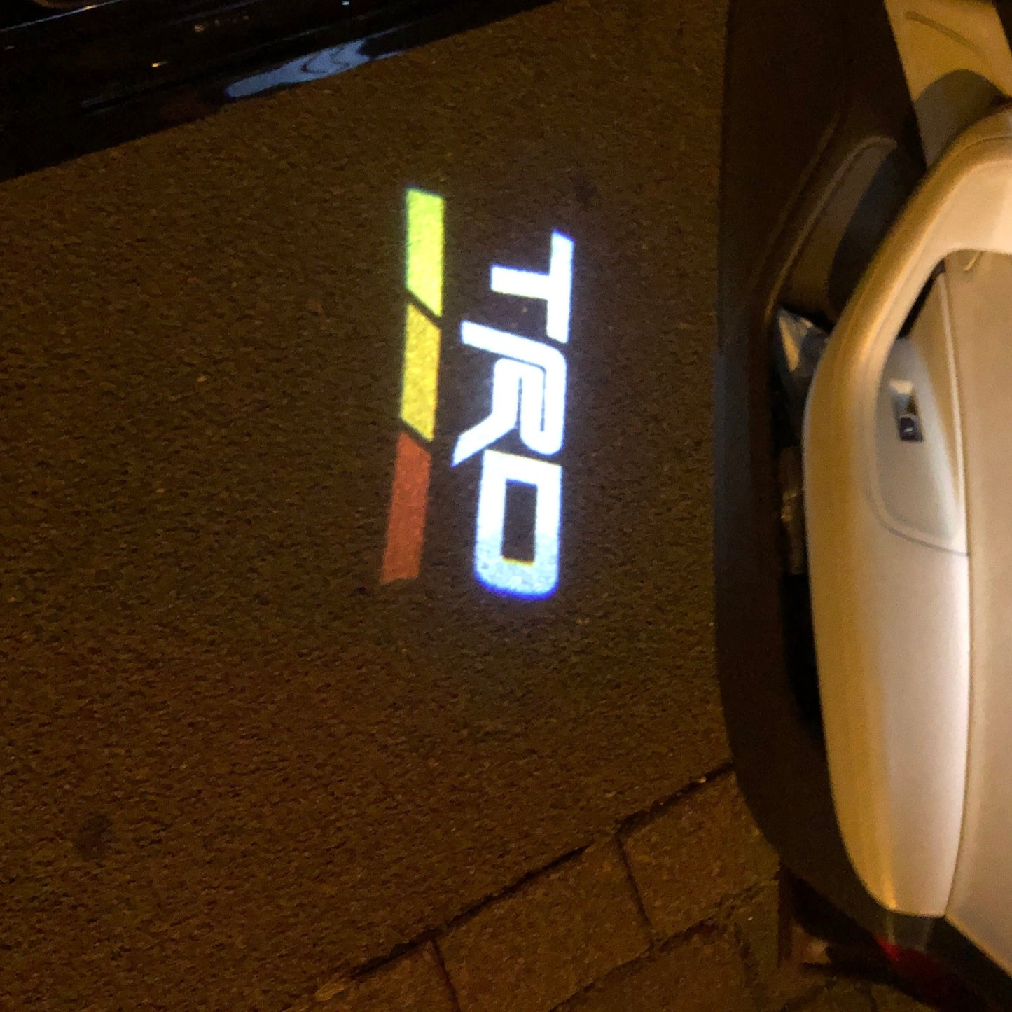 TRD LOGO PROJECTOT LIGHTS Nr.16 (quantity 1 = 2 Logo Films /2 door lights)