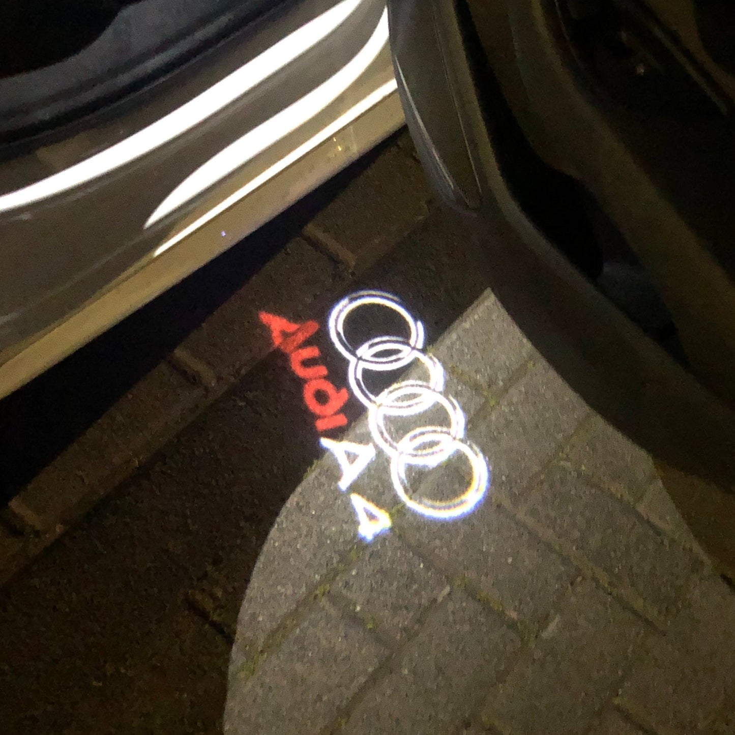 AUDI A4 LOGO PROJECTOT LIGHTS Nr.42 (quantity 1 = 2 Logo Films /2 door lights)