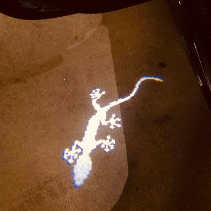 AUDI QUATTRO GECKO LOGO PROJECTOT LIGHTS Nr.67 (quantity 1 = 2 Logo Films /2 door lights)