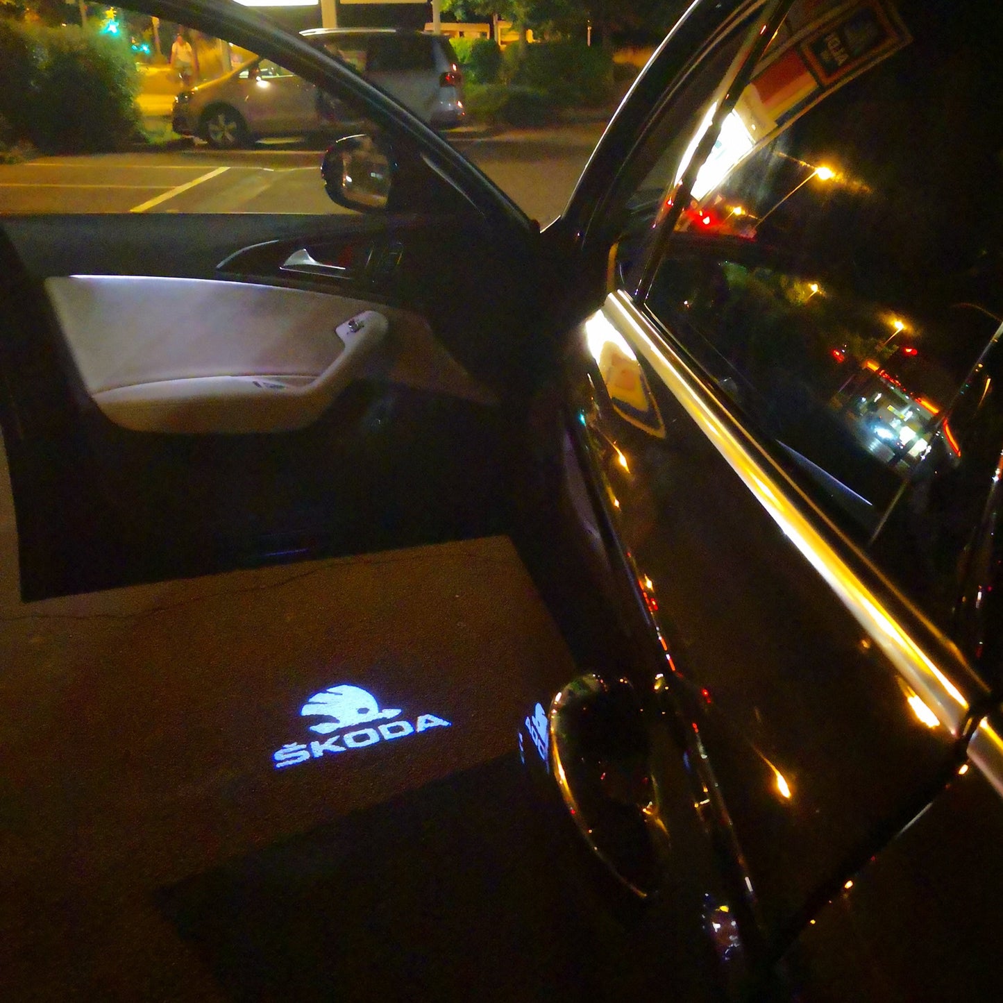 SKODA ORIGINAL LOGO PROJECTOT LIGHTS Nr.10 (quantity 1 = 2 Logo Film / 2 door lights)
