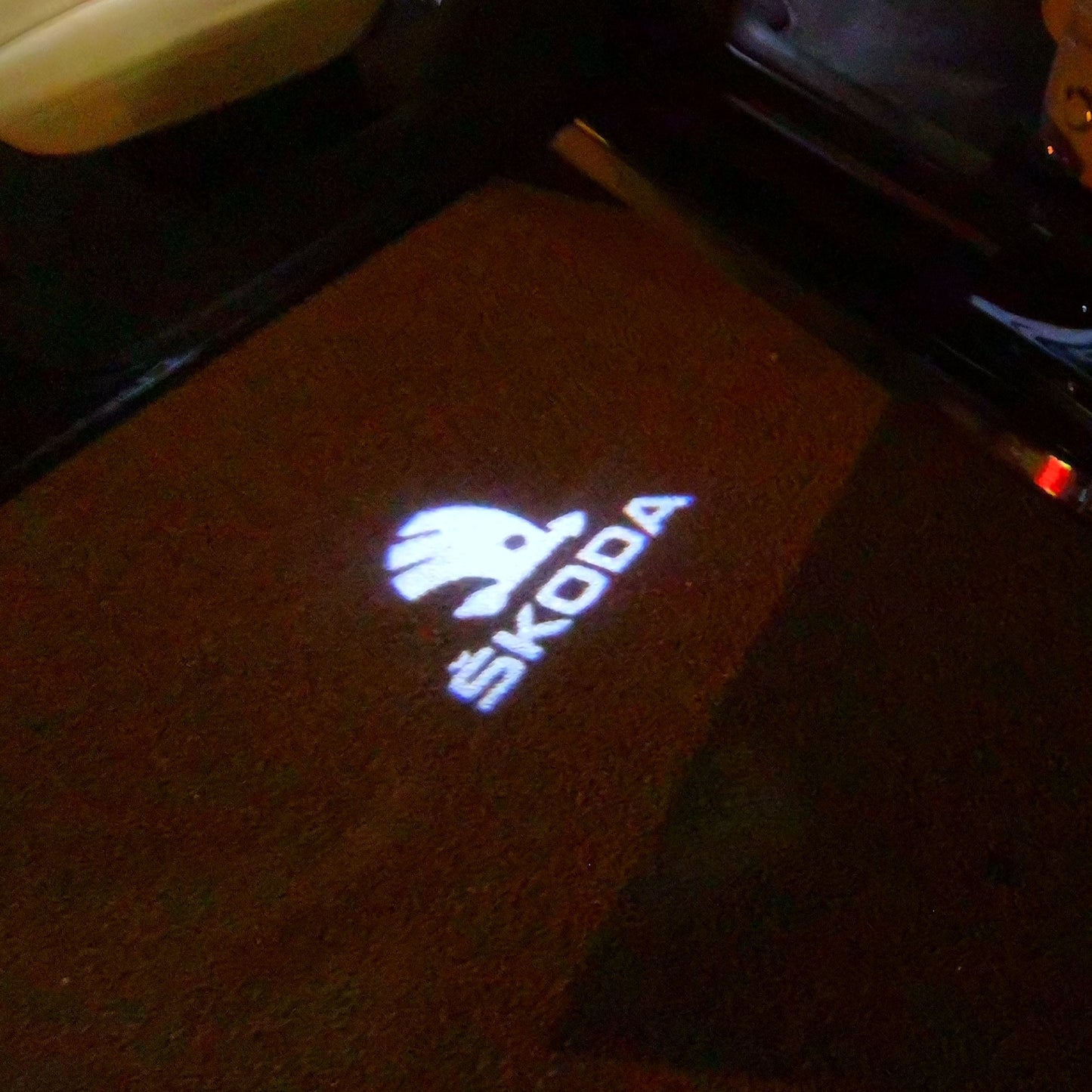 SKODA ORIGINAL LOGO PROJECTOT LIGHTS Nr.10 (quantity 1 = 2 Logo Film / 2 door lights)
