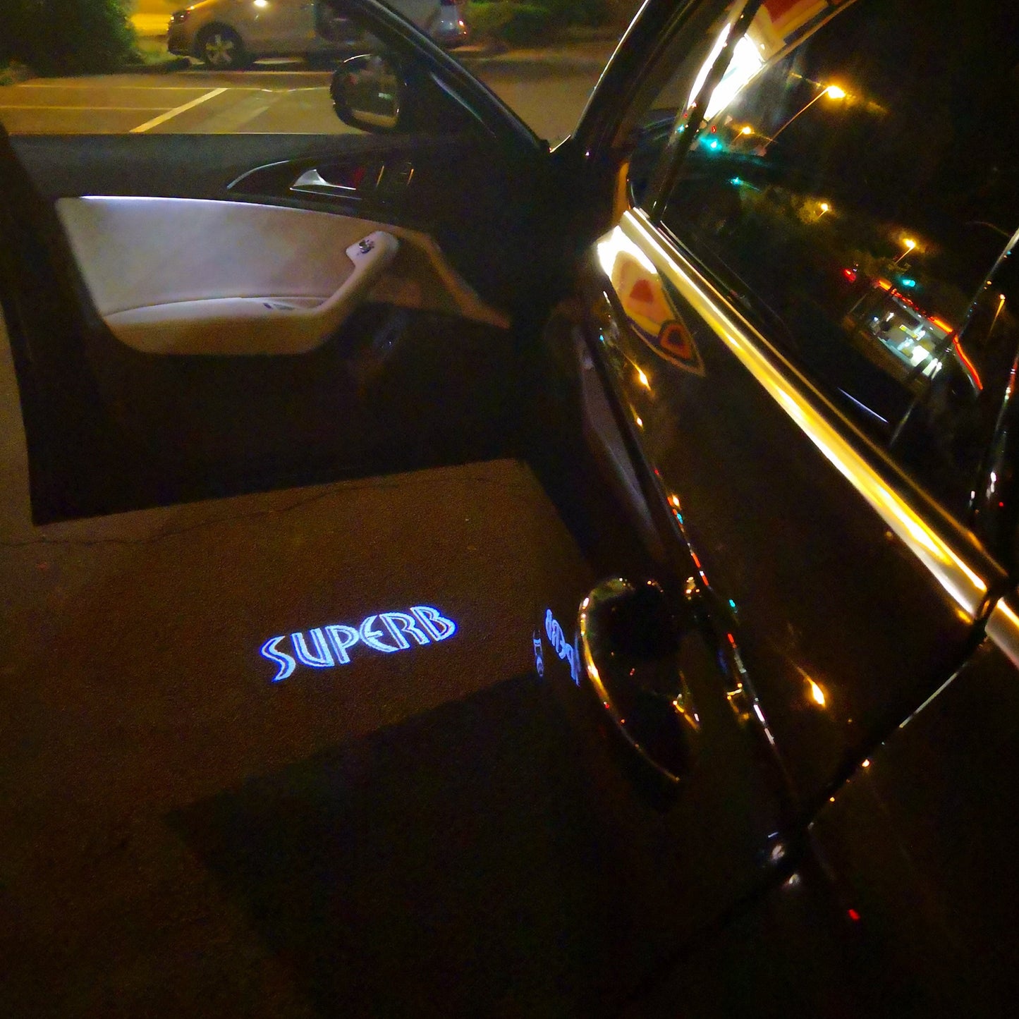 SKODA SUPERB LOGO PROJECTOT LIGHTS Nr.90 (quantity 1 = 2 Logo Film / 2 door lights)
