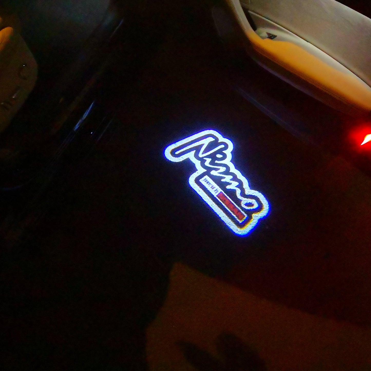 NISMO LOGO PROJECTOT LIGHTS Nr.10 (quantity 1 = 2 Logo Films /2 door lights)