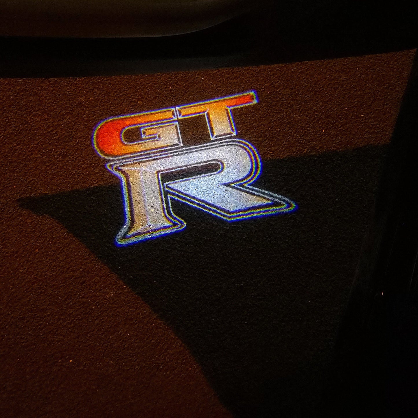 GTR-R35 LOGO PROJECTOT LIGHTS Nr.06 (quantity 1 = 2 Logo Films /2 door lights)