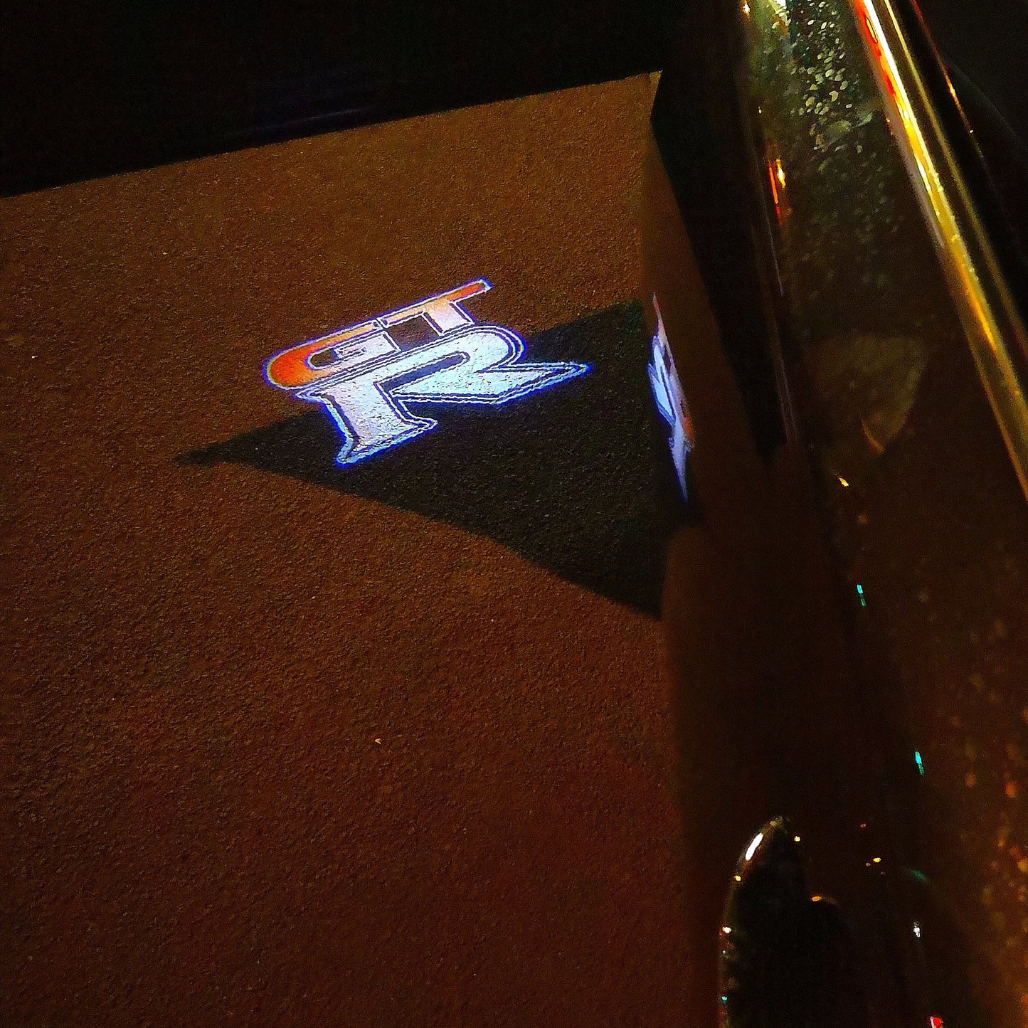 GTR-R35 LOGO PROJECTOT LIGHTS Nr.06 (quantity 1 = 2 Logo Films /2 door lights)