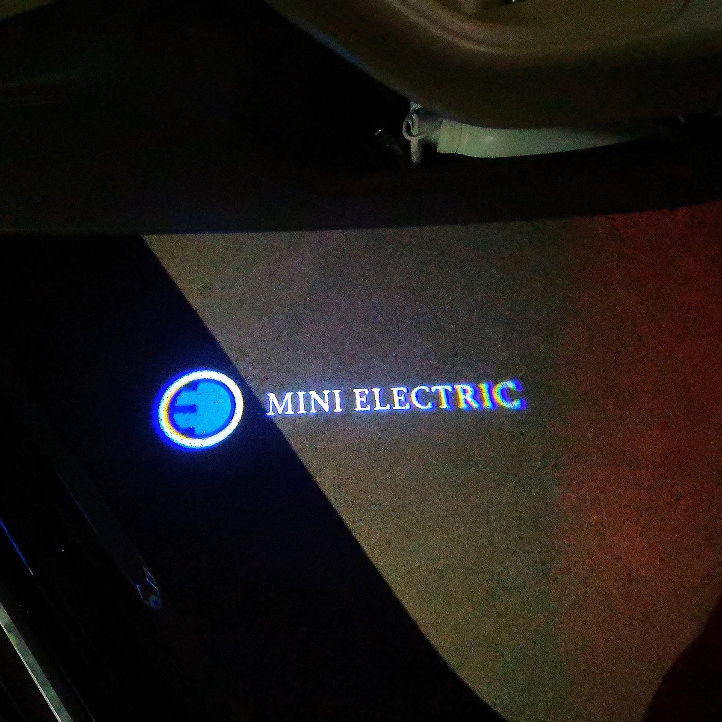 MINI ELECTRIC LOGO PROJECROTR LIGHTS Nr.62 (quantity 1 = 2 Logo Film / 2 door lights)