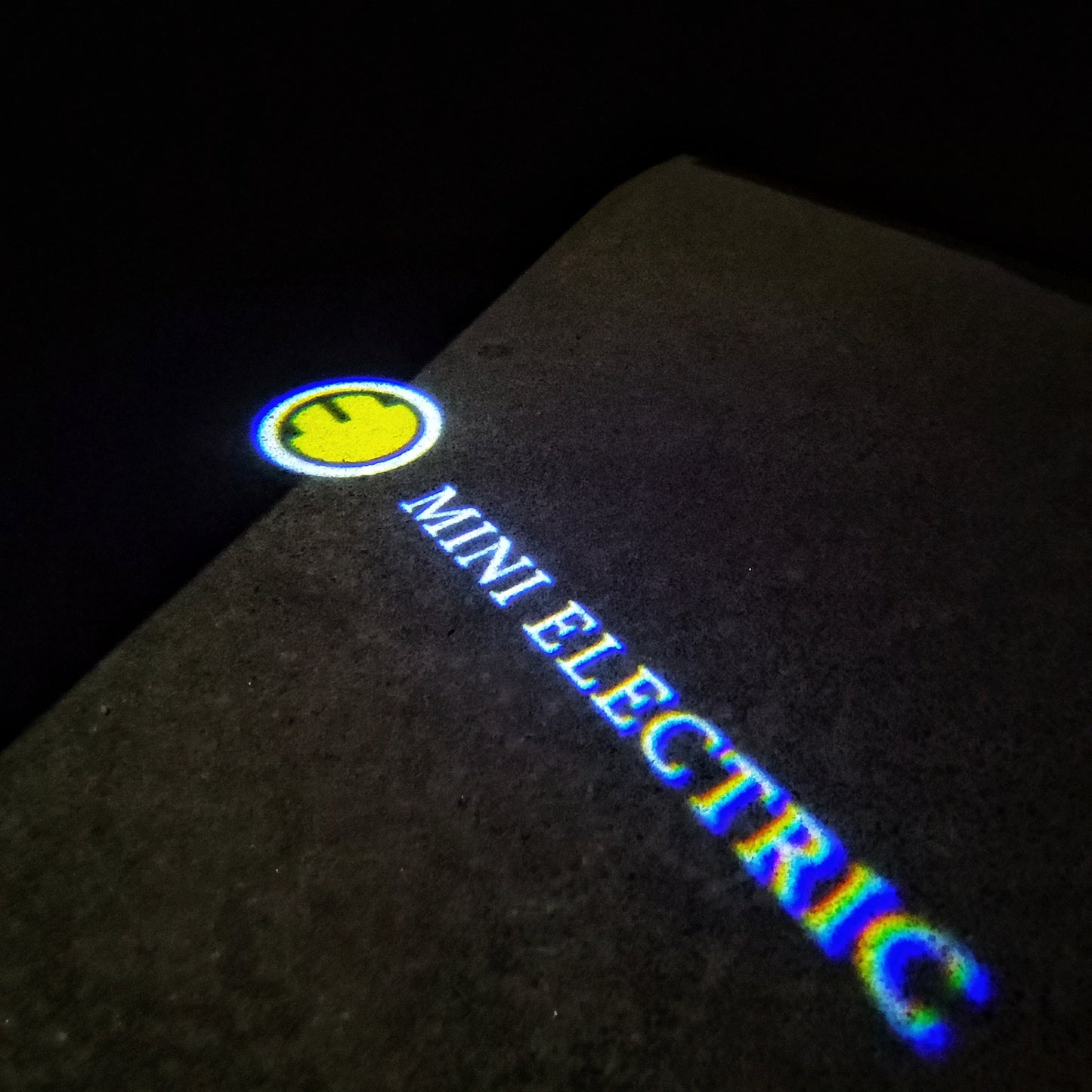 MINI ELECTRIC LOGO PROJECROTR LIGHTS Nr.63 (quantity 1 = 2 Logo Film / 2 door lights)
