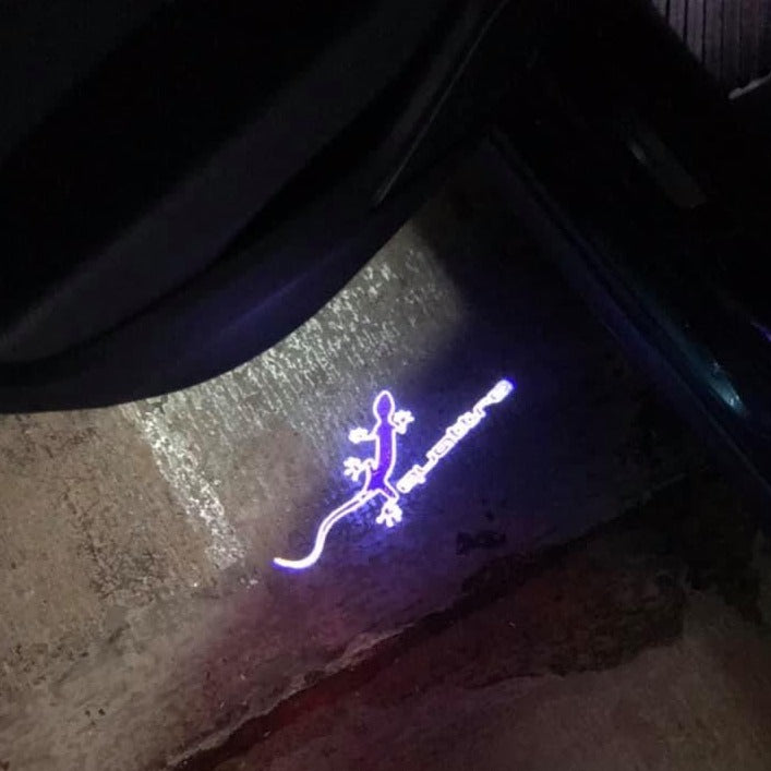 AUDI QUATTRO GECKO LOGO PROJECTOT LIGHTS Nr.68 (quantity 1 = 2 Logo Films /2 door lights)