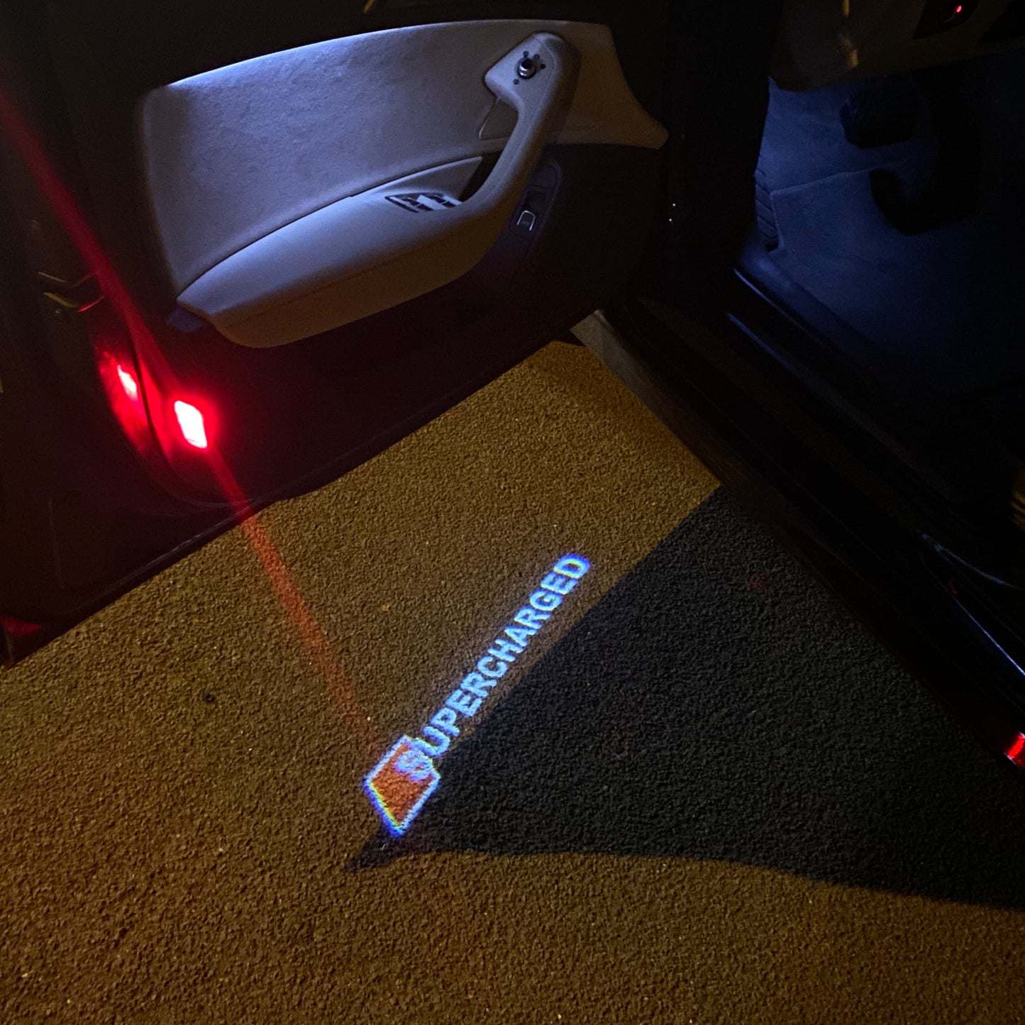 AUDI SUPERCHARGED LOGO PROJECTOT LIGHTS Nr.72 (quantity 1 = 2 Logo Films /2 door lights)