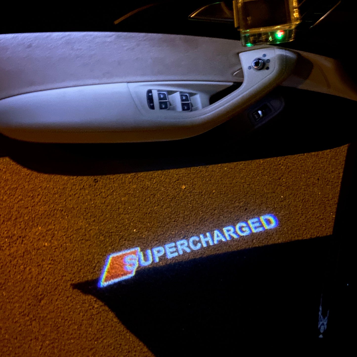 AUDI SUPERCHARGED LOGO PROJECTOT LIGHTS Nr.72 (quantity 1 = 2 Logo Films /2 door lights)
