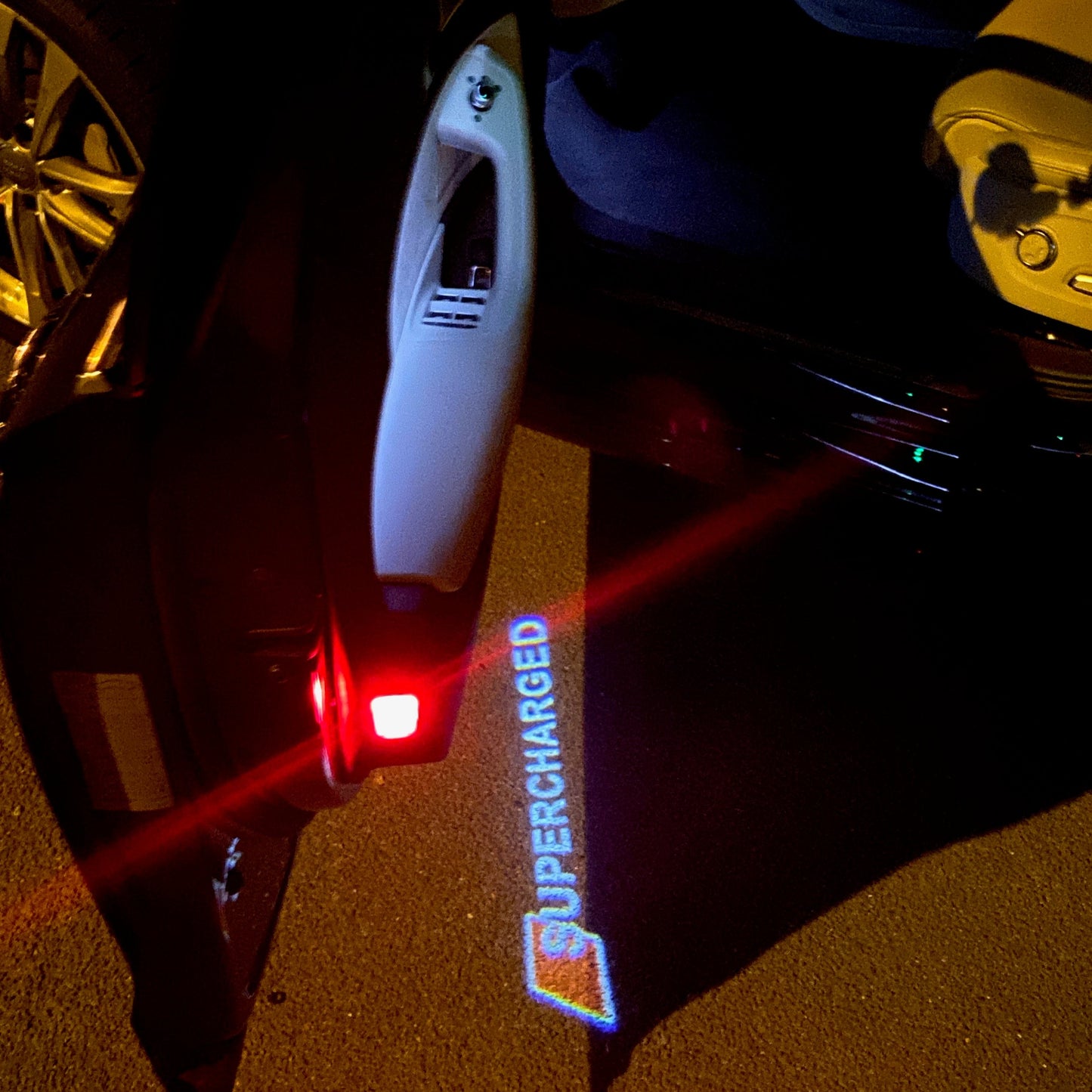 AUDI SUPERCHARGED LOGO PROJECTOT LIGHTS Nr.72 (quantity 1 = 2 Logo Films /2 door lights)