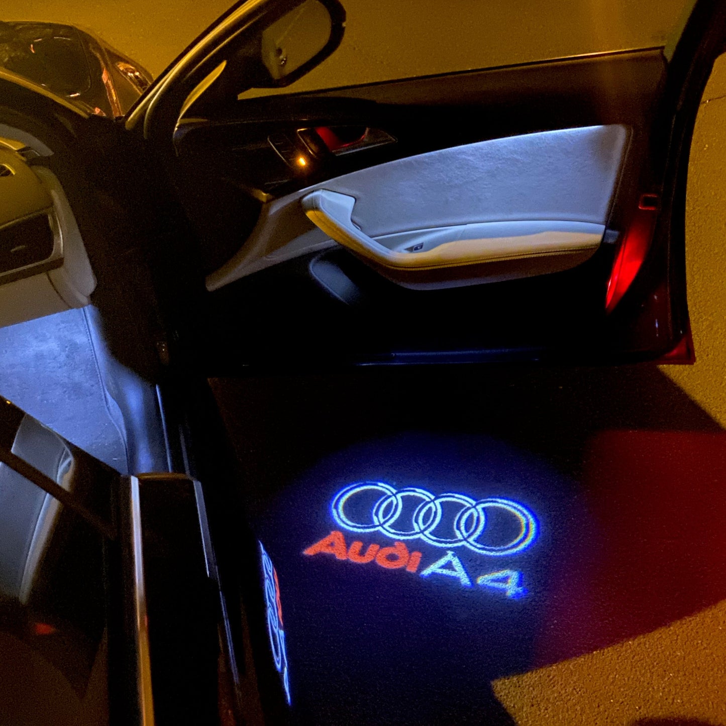 AUDI A4 LOGO PROJECTOT LIGHTS Nr.42 (quantity 1 = 2 Logo Films /2 door lights)