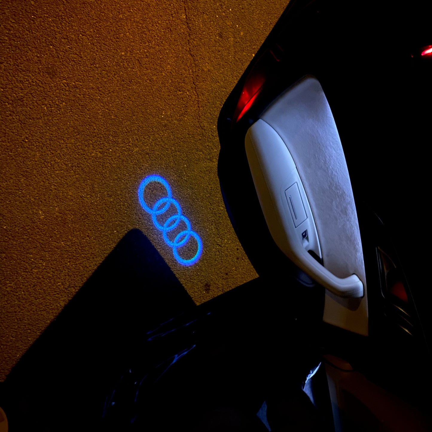 AUDI 4 RINGS LOGO PROJECTOT LIGHTS Nr.08 (quantity 1 = 2 Logo Films /2 door lights)