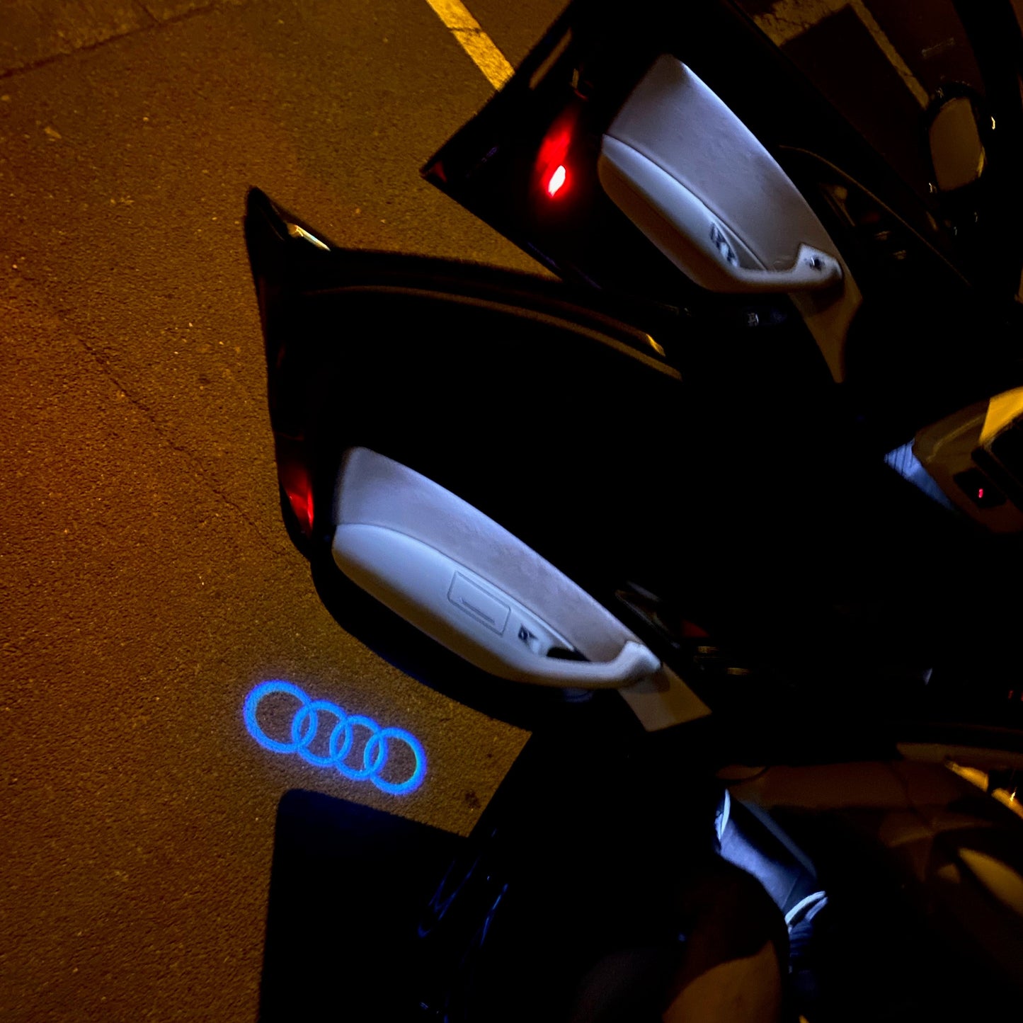 AUDI 4 RINGS LOGO PROJECTOT LIGHTS Nr.08 (quantity 1 = 2 Logo Films /2 door lights)