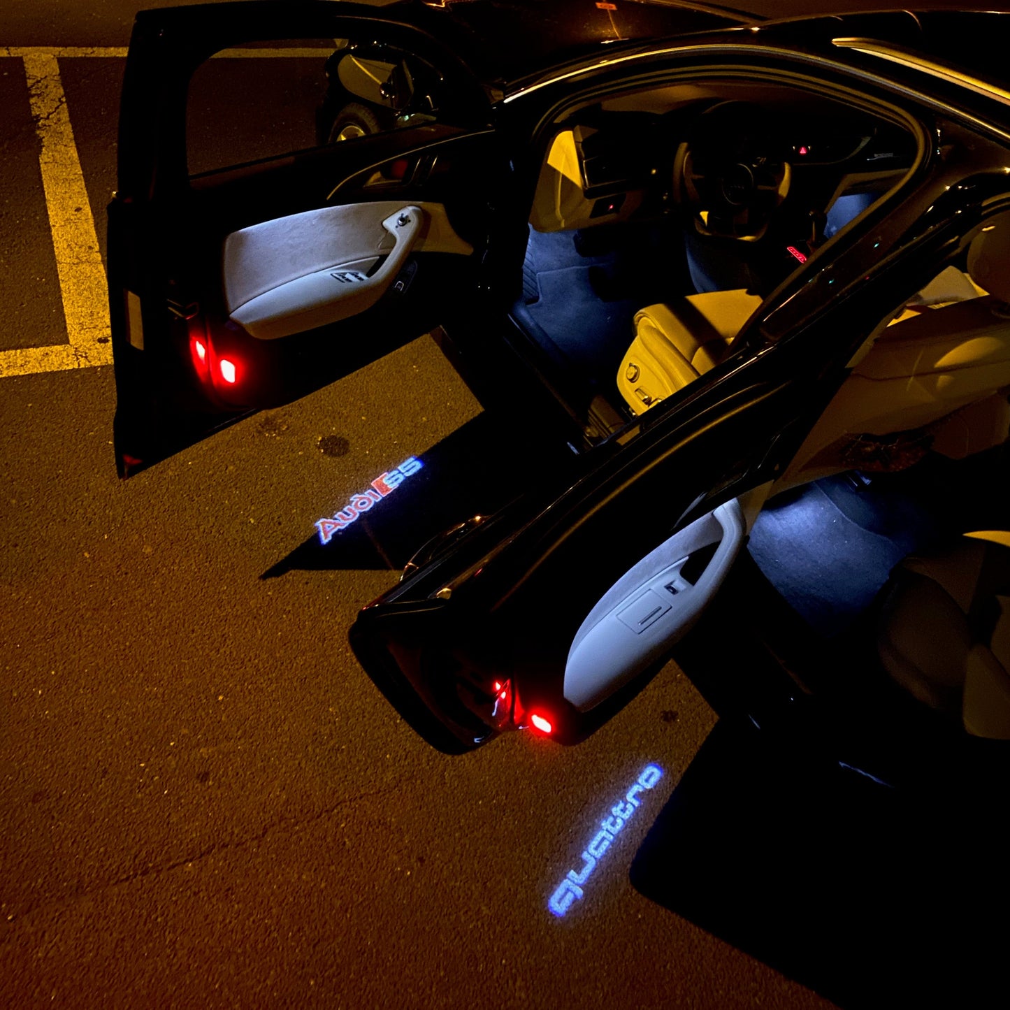 AUDI QUATTRO LOGO PROJECTOT LIGHTS Nr.98 (quantity 1 = 2 Logo Films /2 door lights)