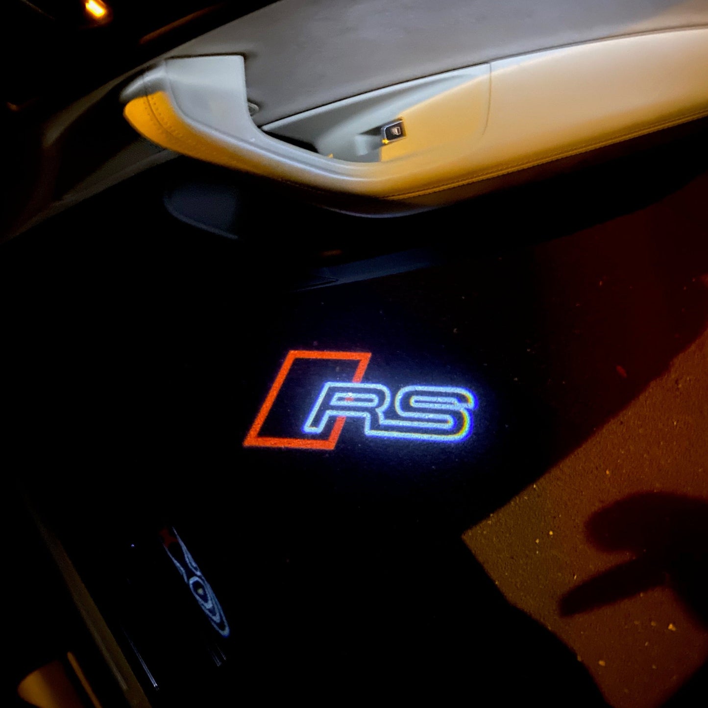 AUDI RS LOGO PROJECTOT LIGHTS Nr.126 (quantity 1 = 2 Logo Films /2 door lights)