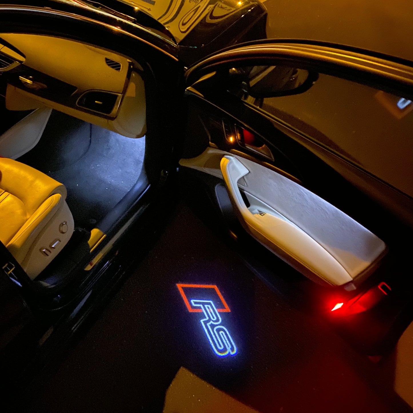 AUDI RS LOGO PROJECTOT LIGHTS Nr.126 (quantity 1 = 2 Logo Films /2 door lights)