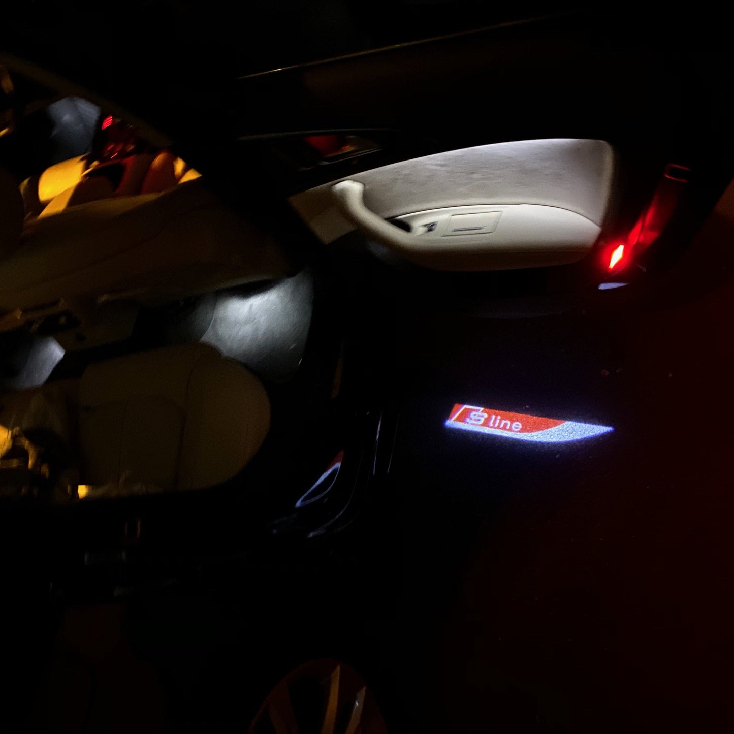 AUDI S LINE LOGO PROJECTOT LIGHTS Nr.104 (quantity 1 = 2 Logo Films /2 door lights)