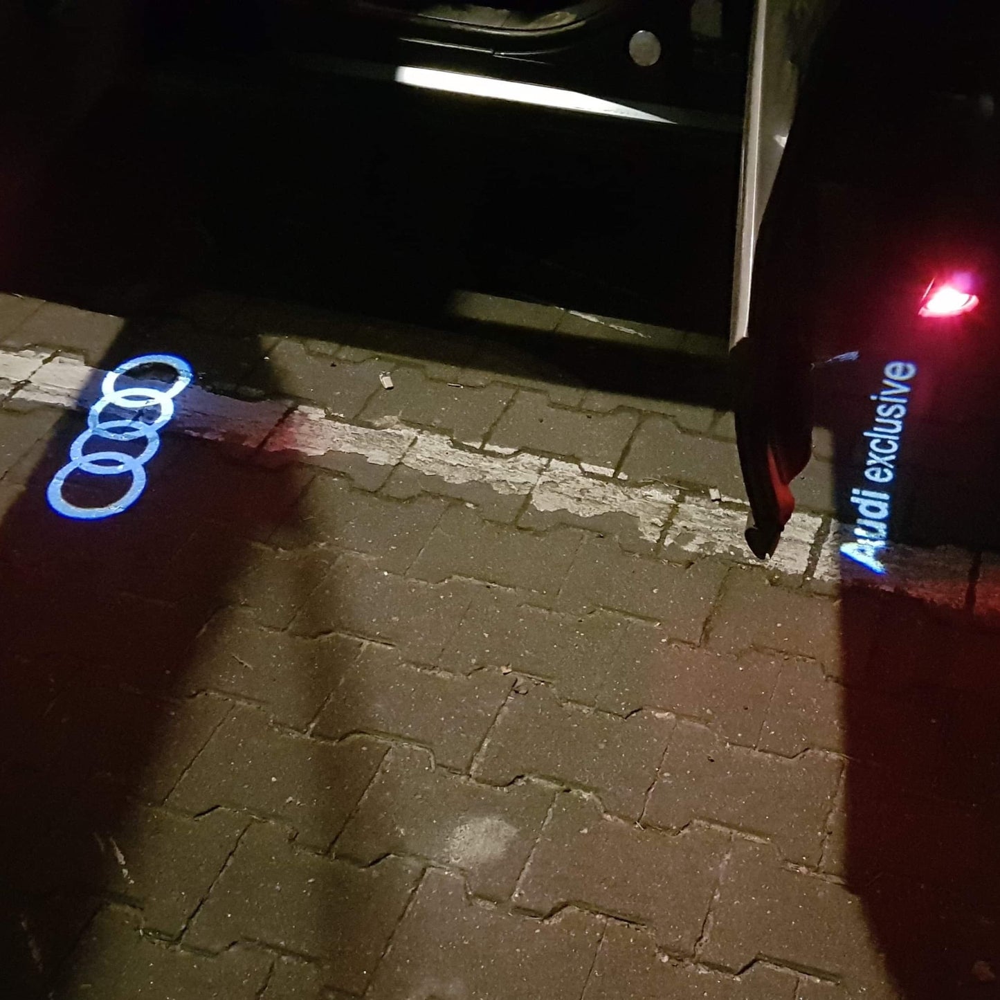 AUDI EXCLUSIVE LOGO PROJECTOT LIGHTS Nr.73 (quantity 1 = 2 Logo Films /2 door lights)