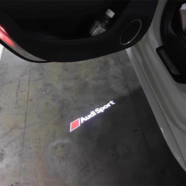 AUDI SPORT LOGO PROJECTOT LIGHTS Nr.69 (quantity 1 = 2 Logo Films /2 door lights)